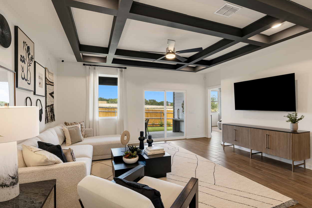 A living room with a tv and couches.