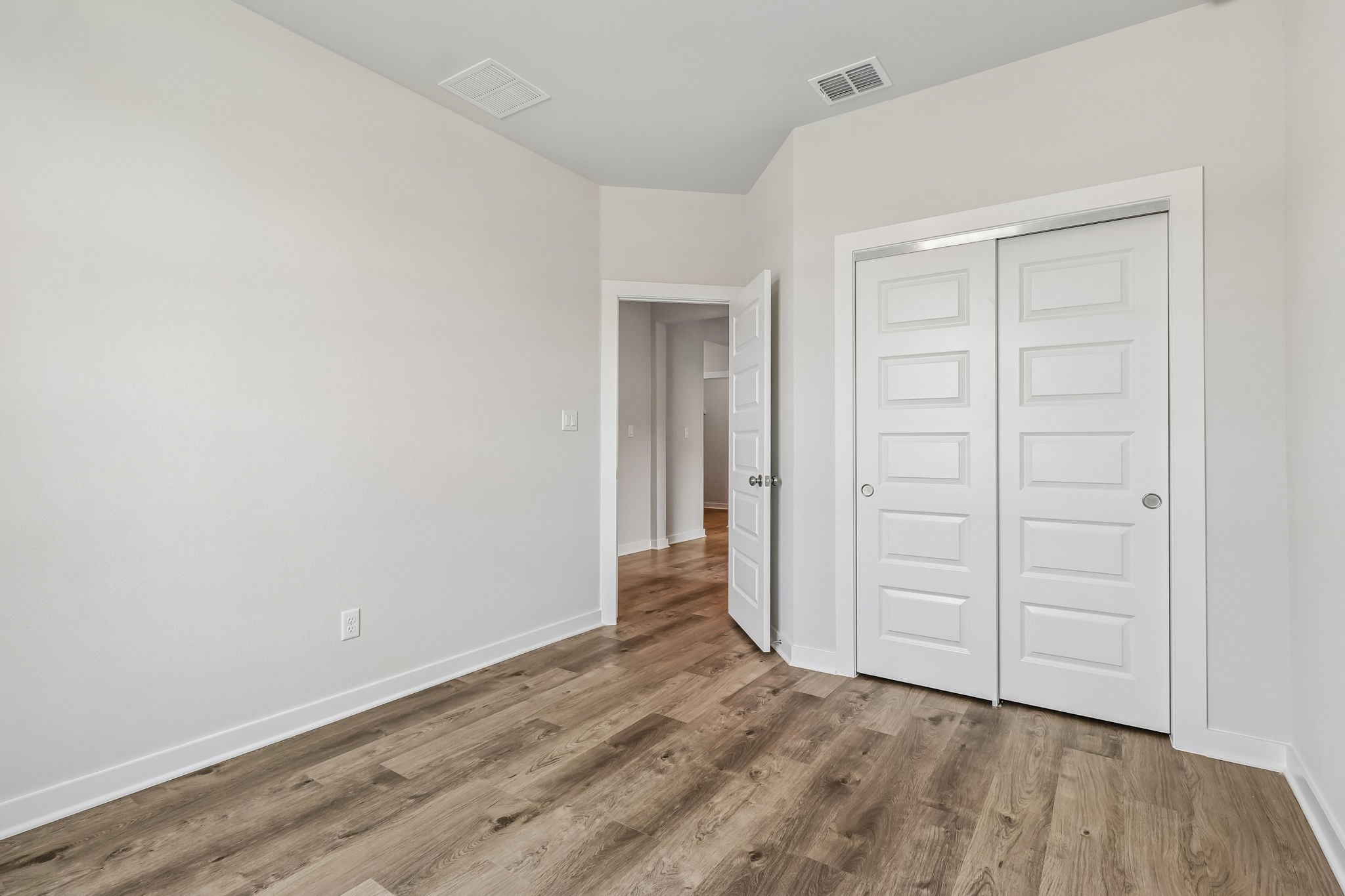 A room with white doors.