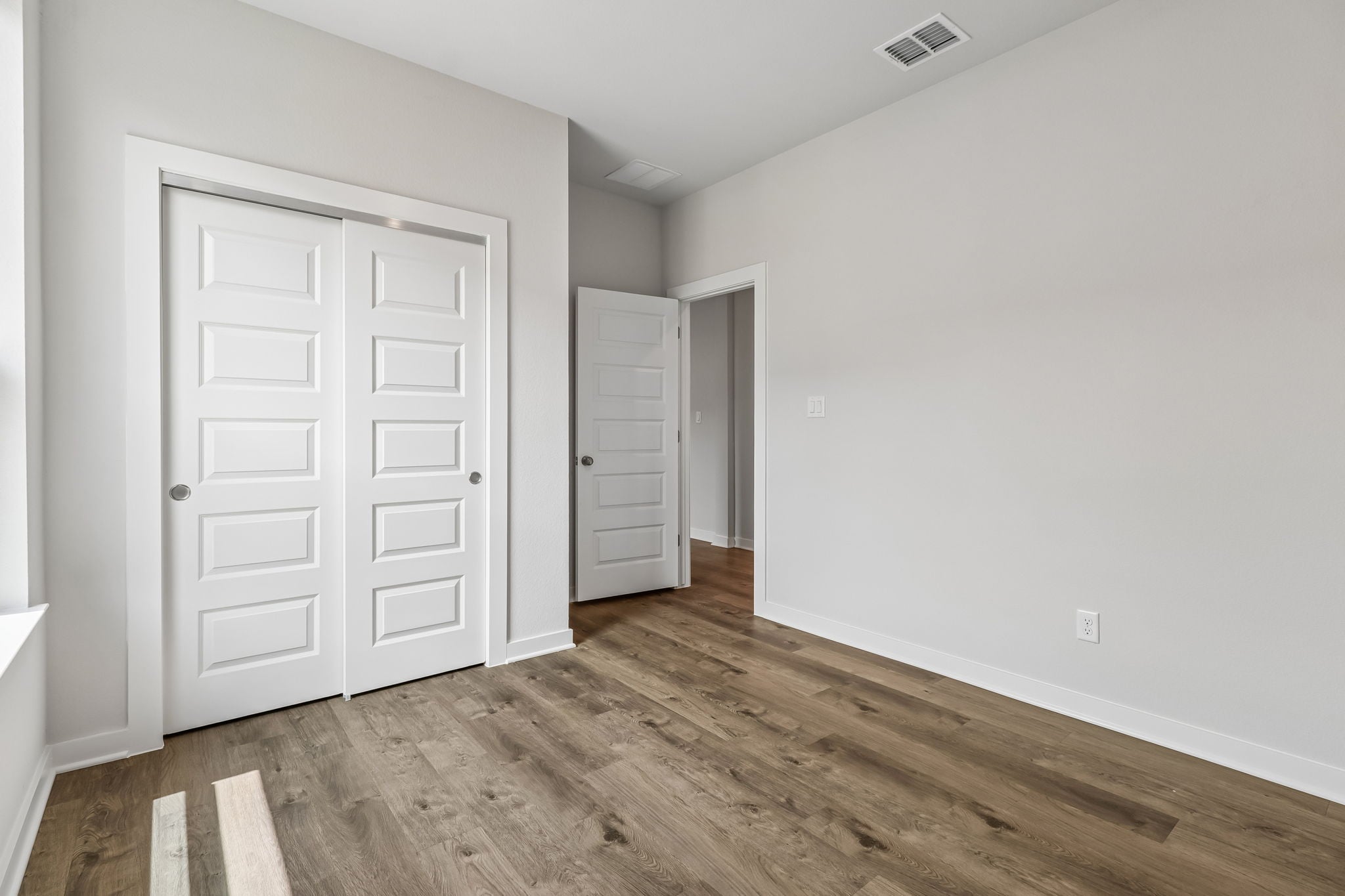 A room with white doors.