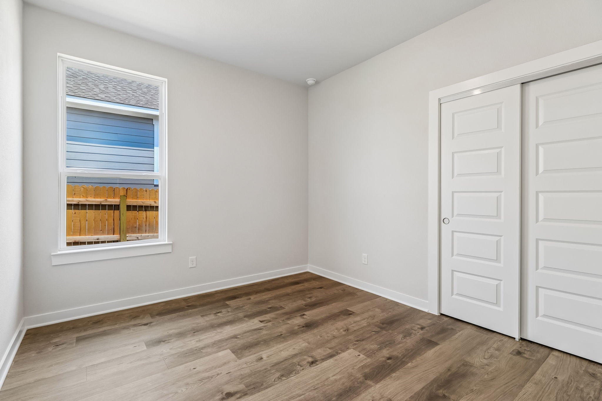 A room with white doors.