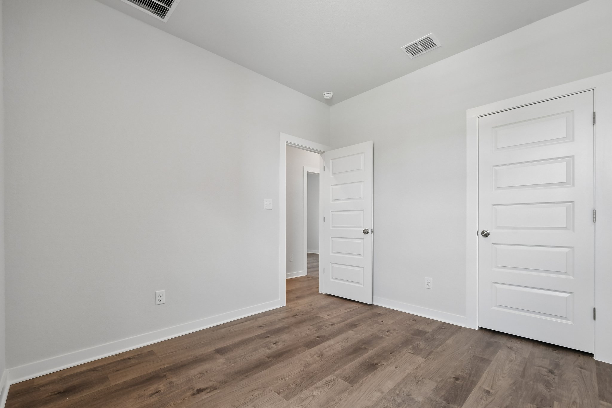 A room with white doors.