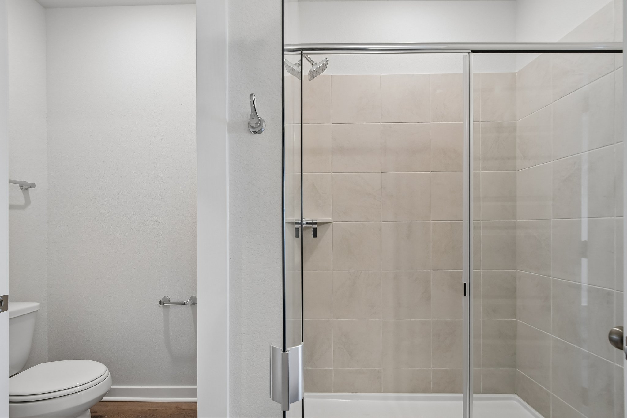 A shower unit in a bathroom.