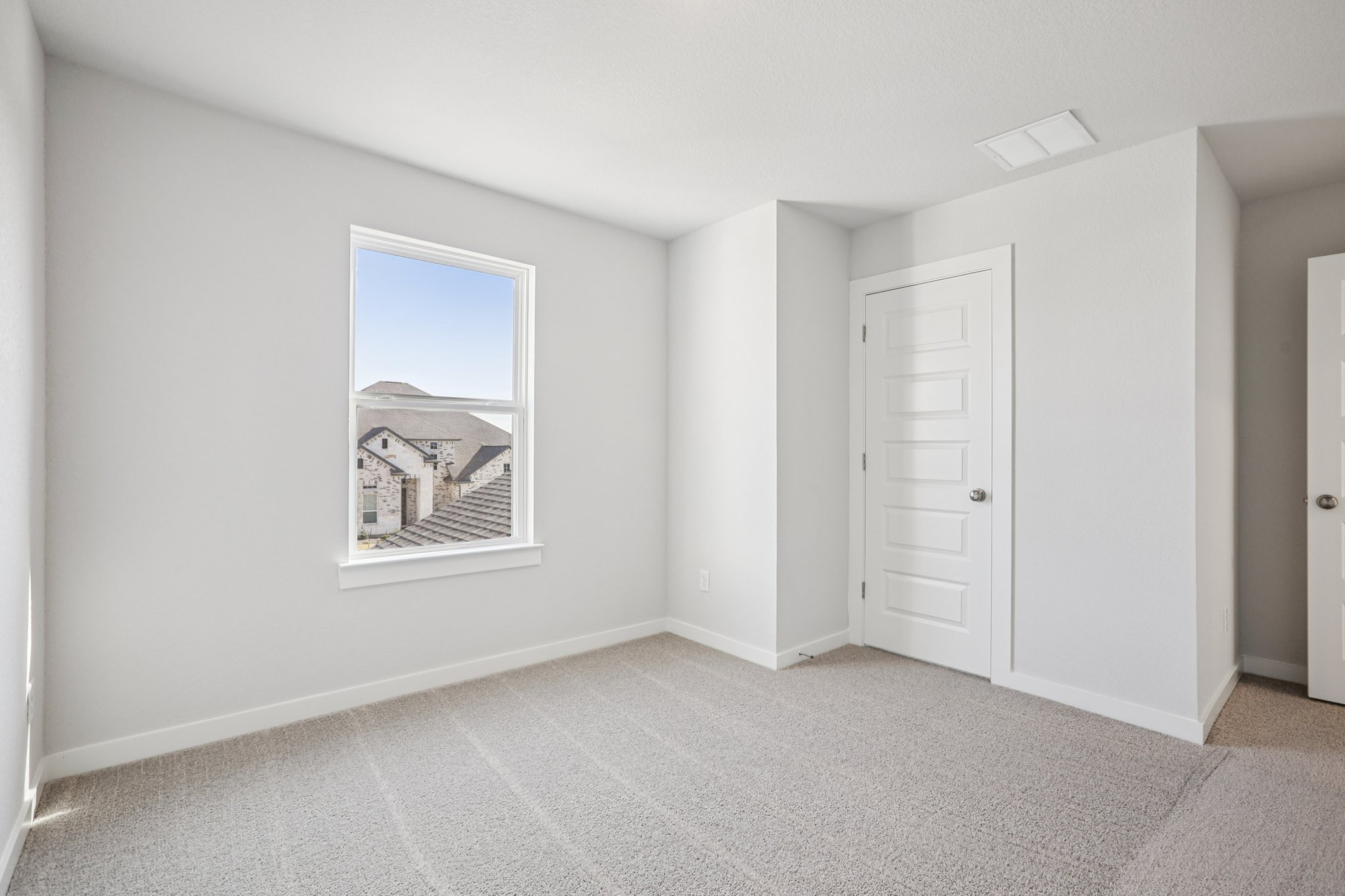 A room with white doors.