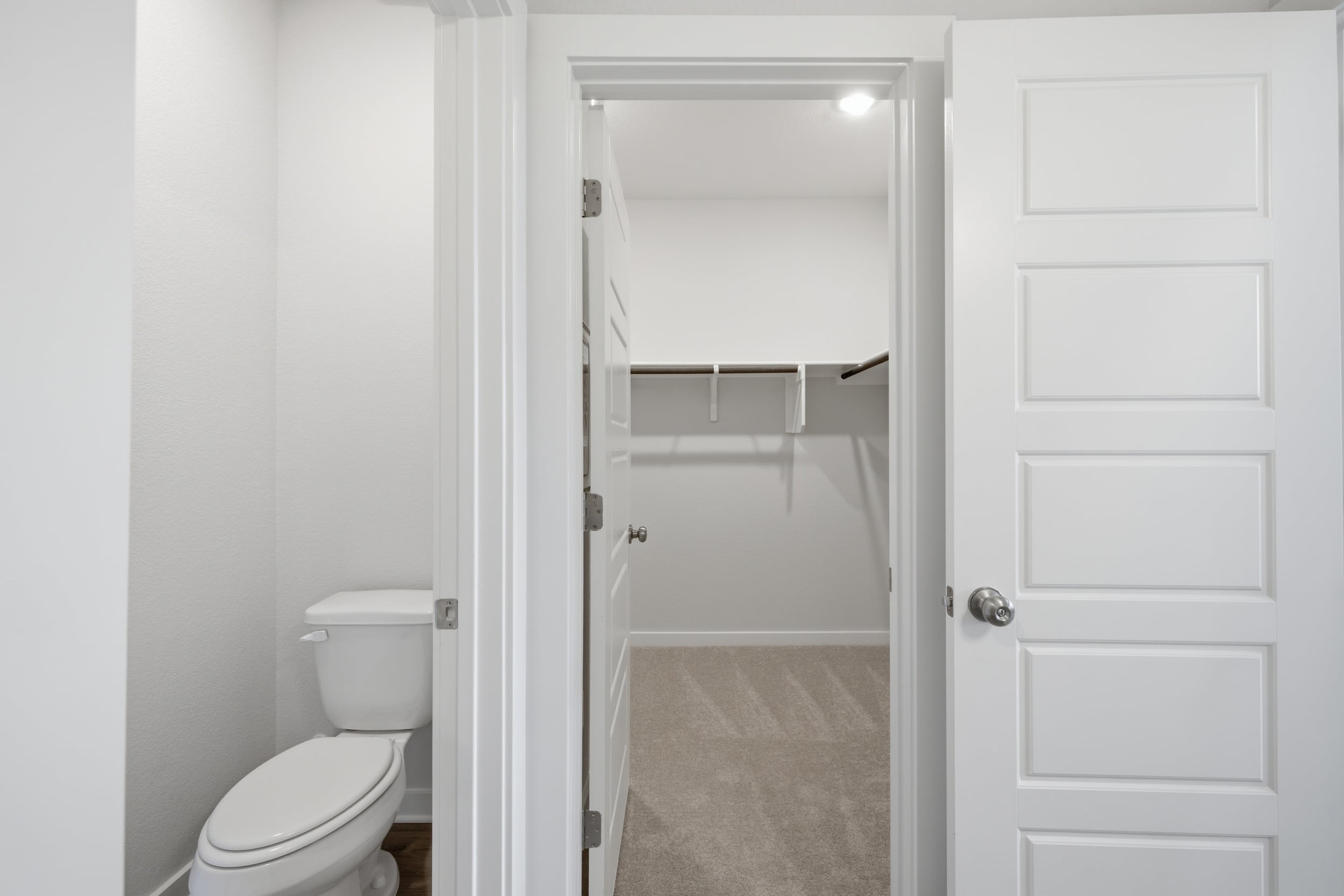 A bathroom with a shower unit.