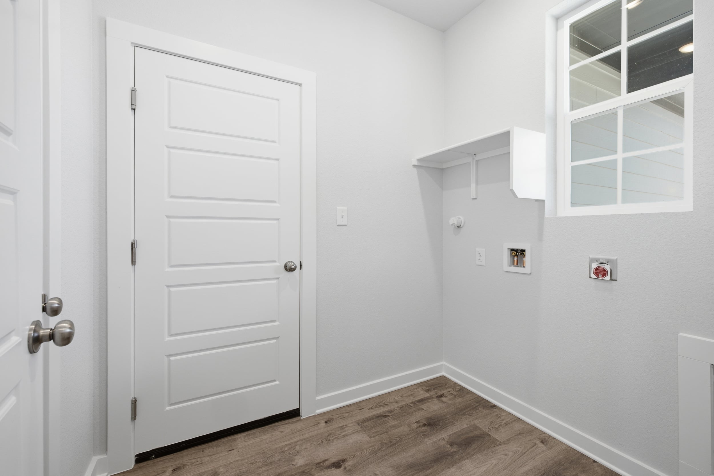 A white door in a room.