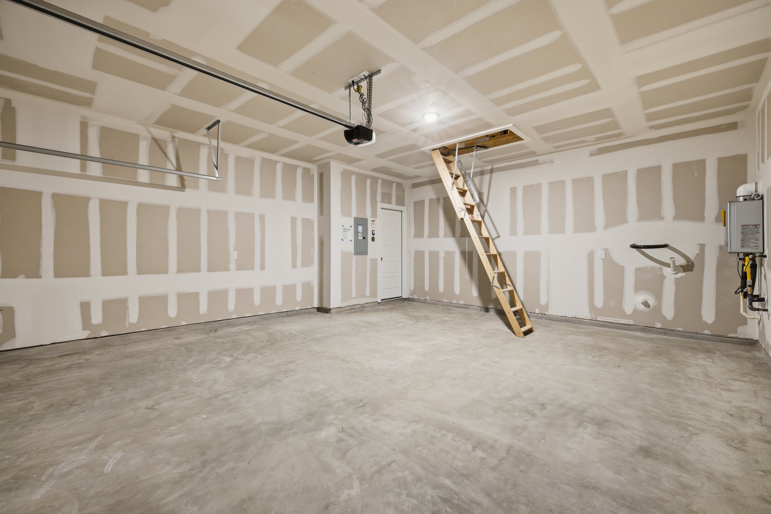 A room with a ladder and a ladder.