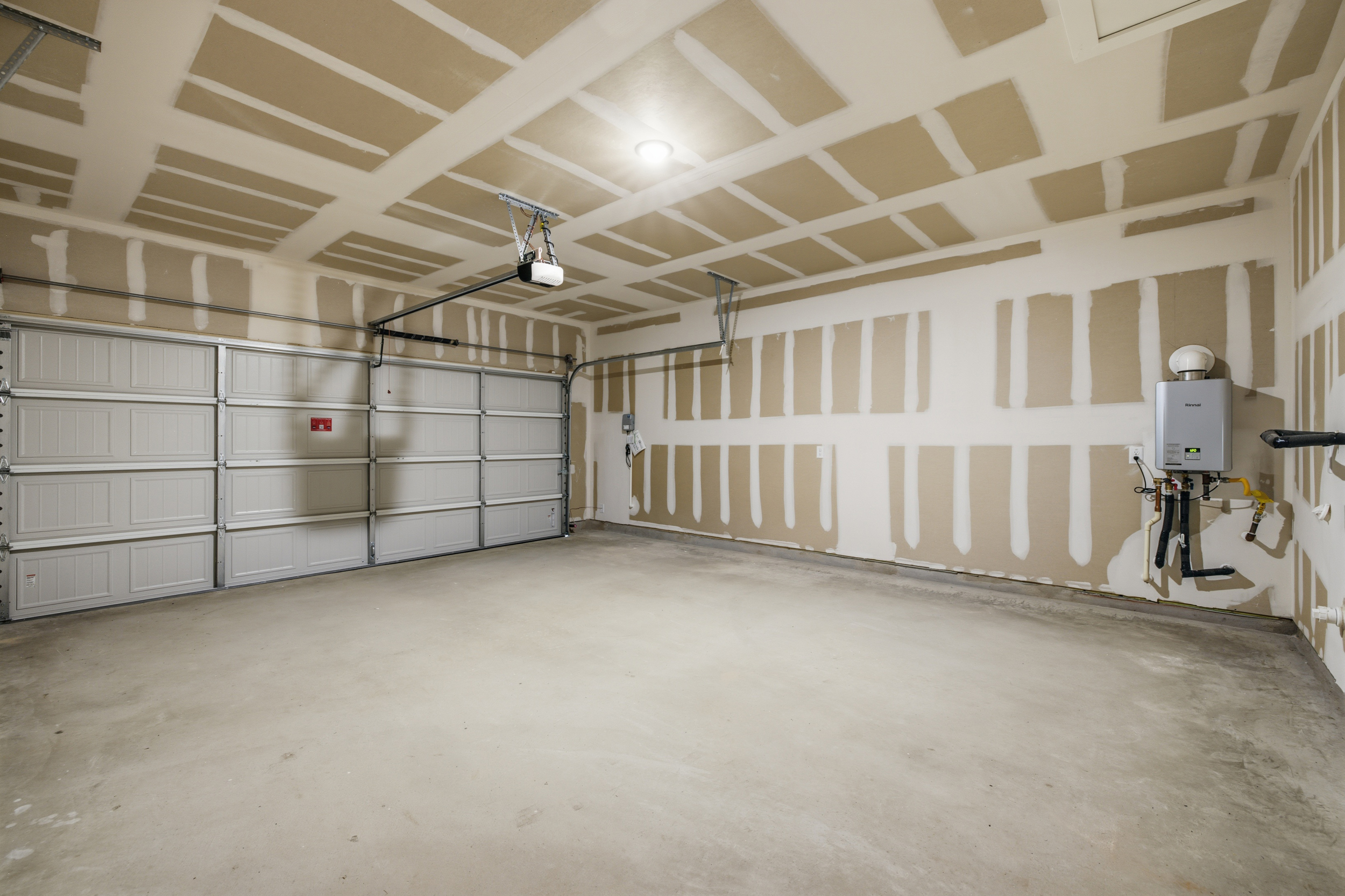 A room with a white wall and a white floor.