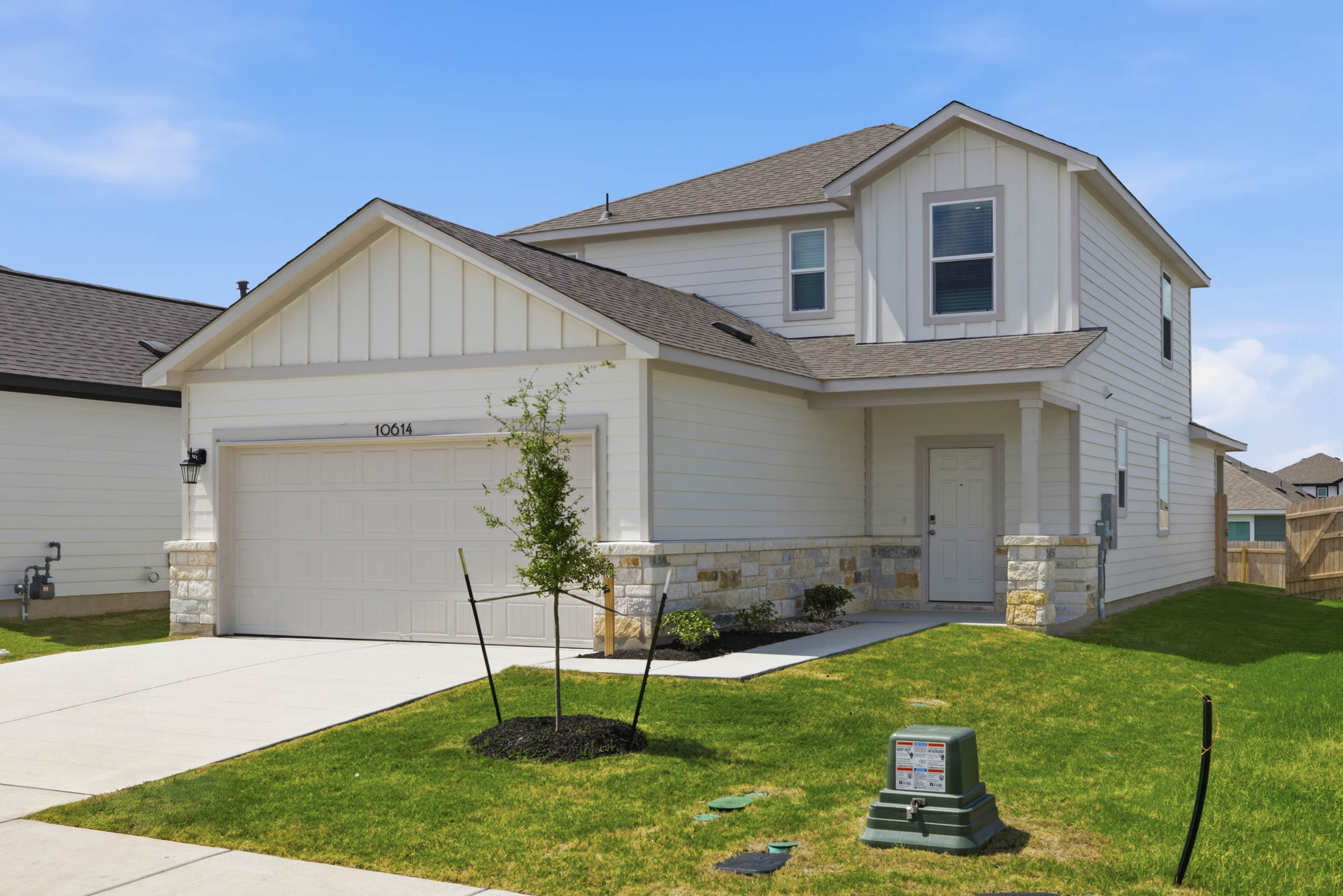 A house with a lawn.