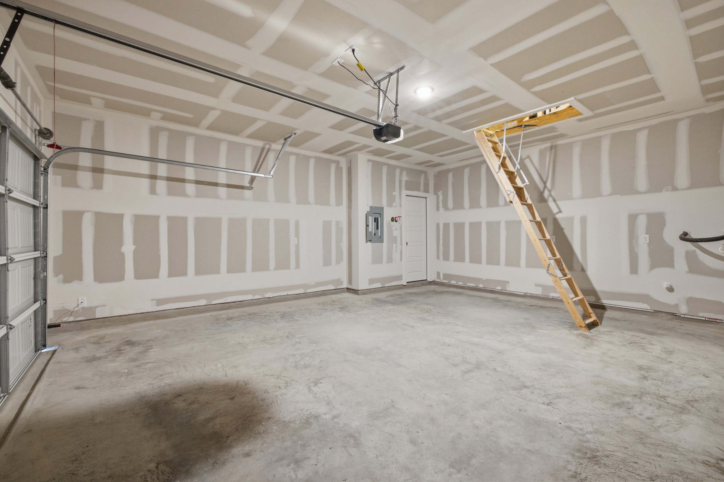 A room with a ladder and a ladder.