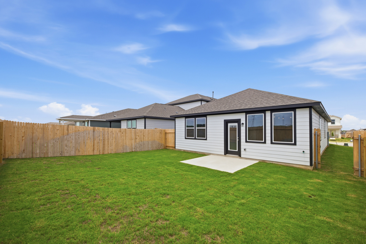 A house with a fence around it.