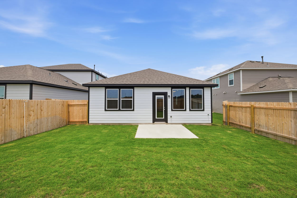 A house with a fence around it.