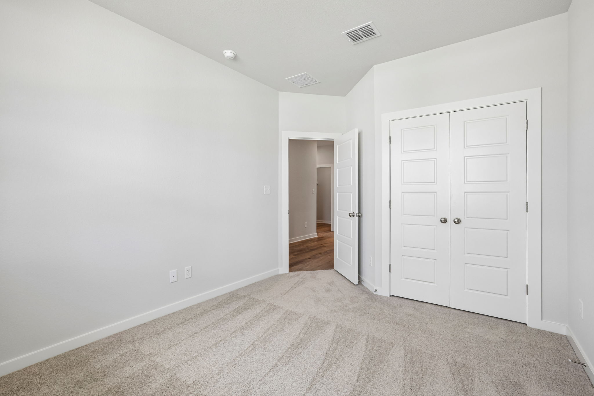 A room with white doors.