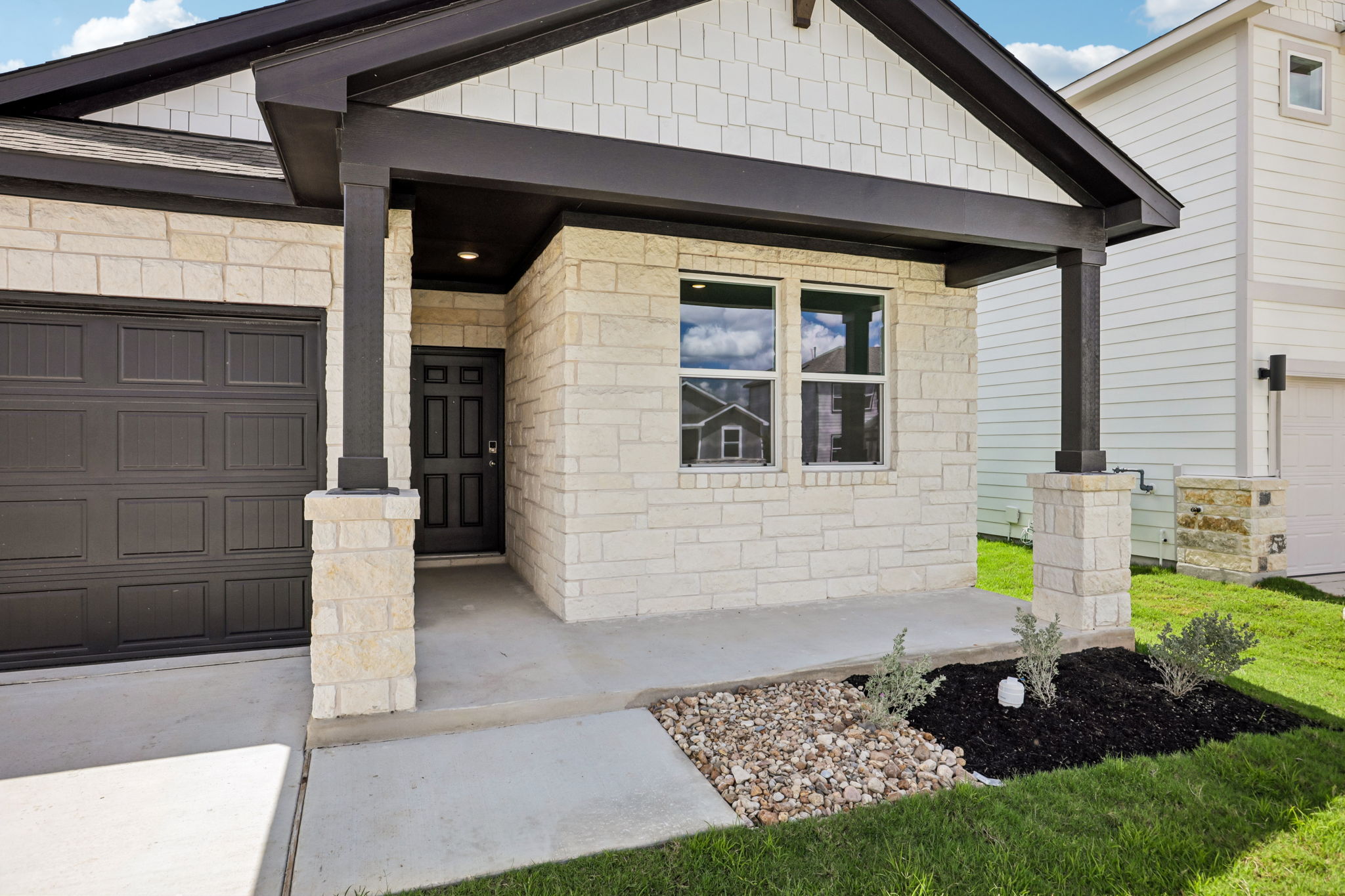 A house with a front yard.