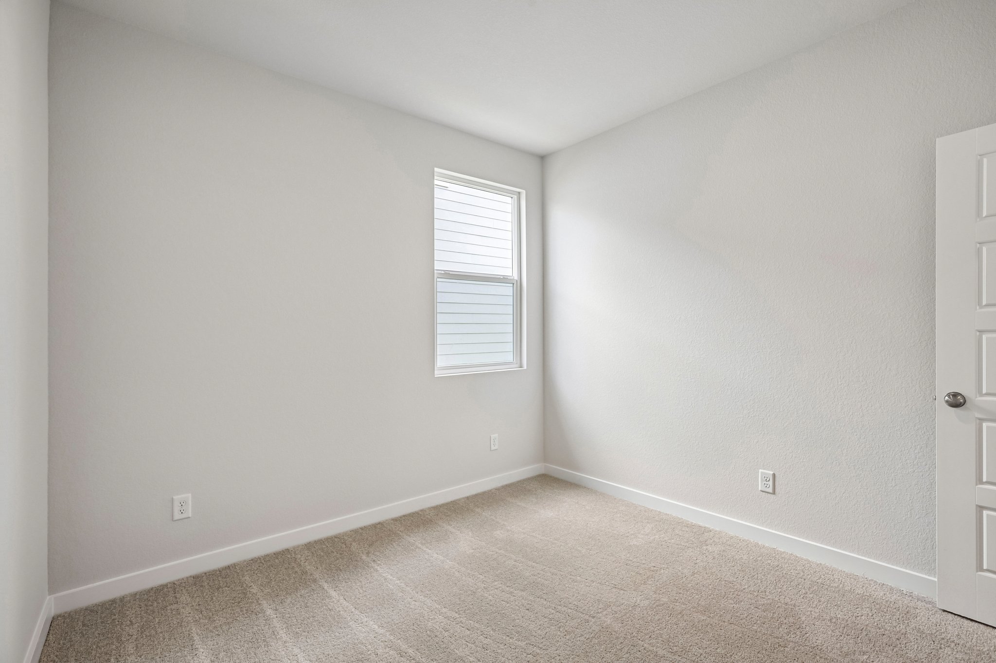 A room with white walls.