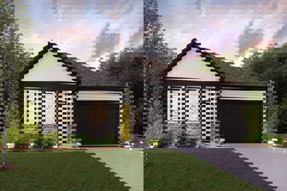 A house with a lawn and trees.