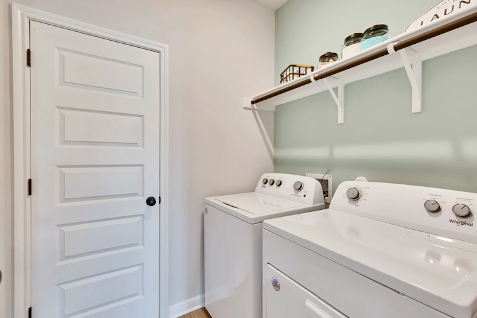 A white washer and dryer.