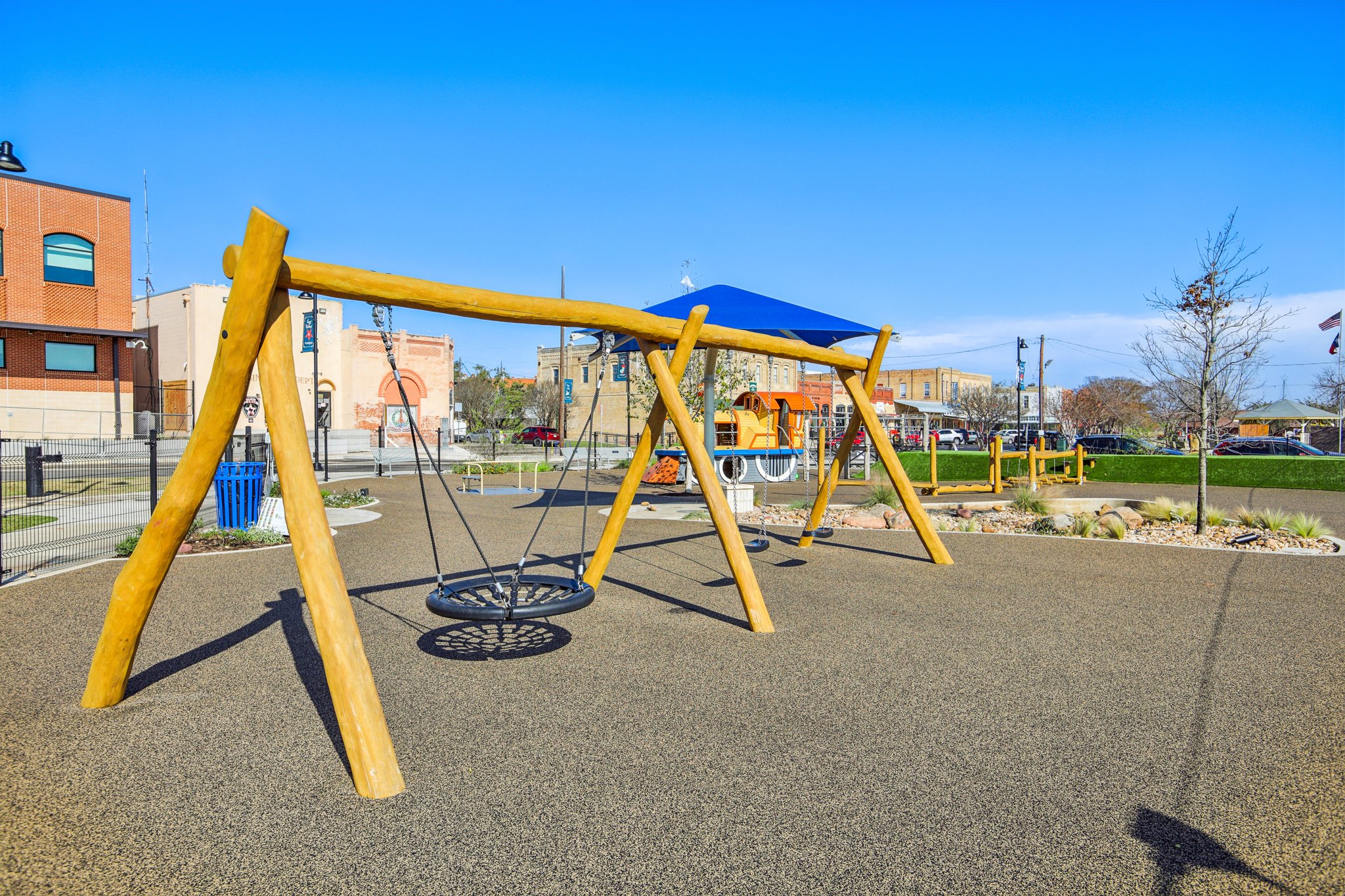 A playground with yellow slide.