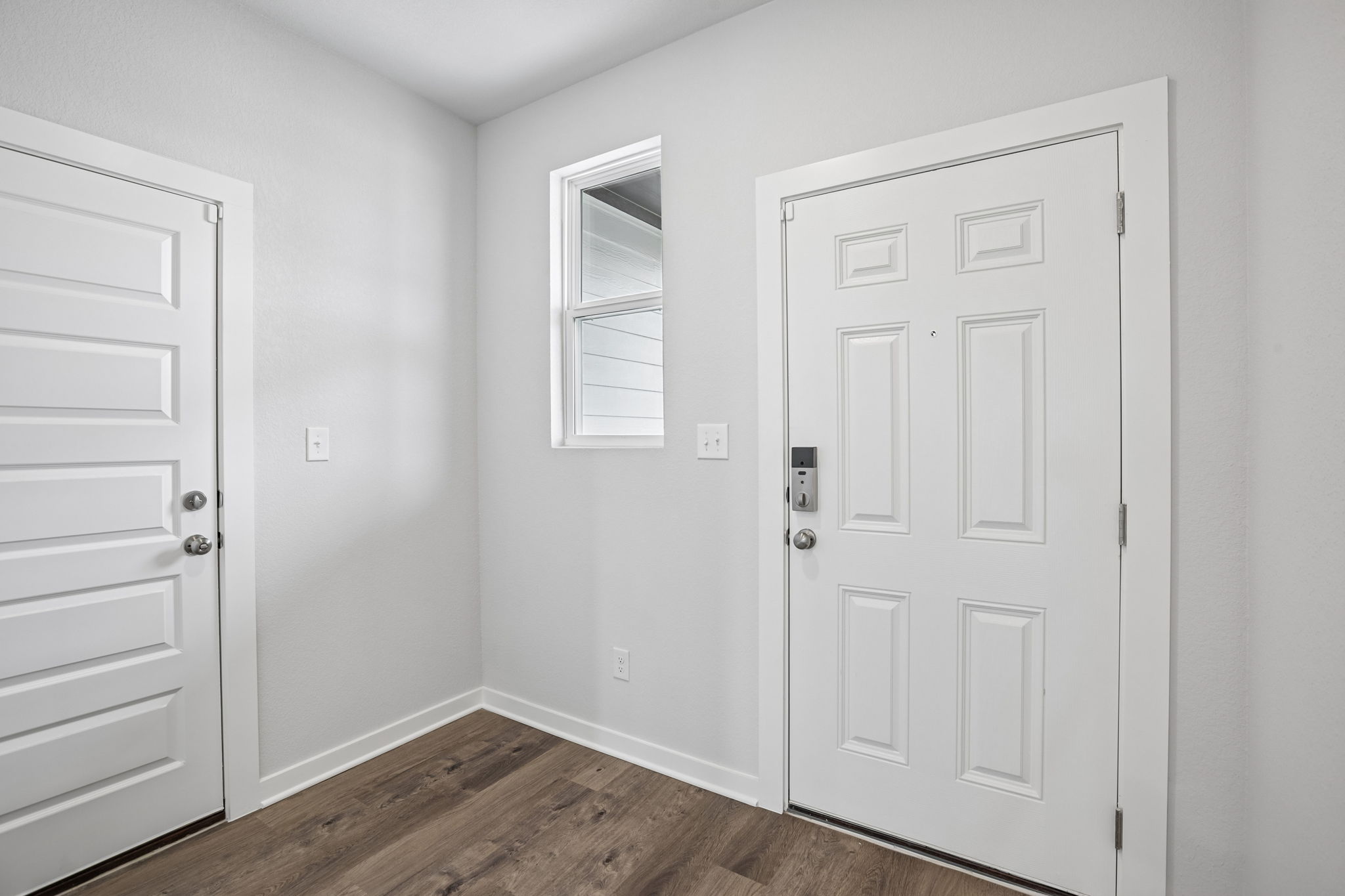 A room with white doors.