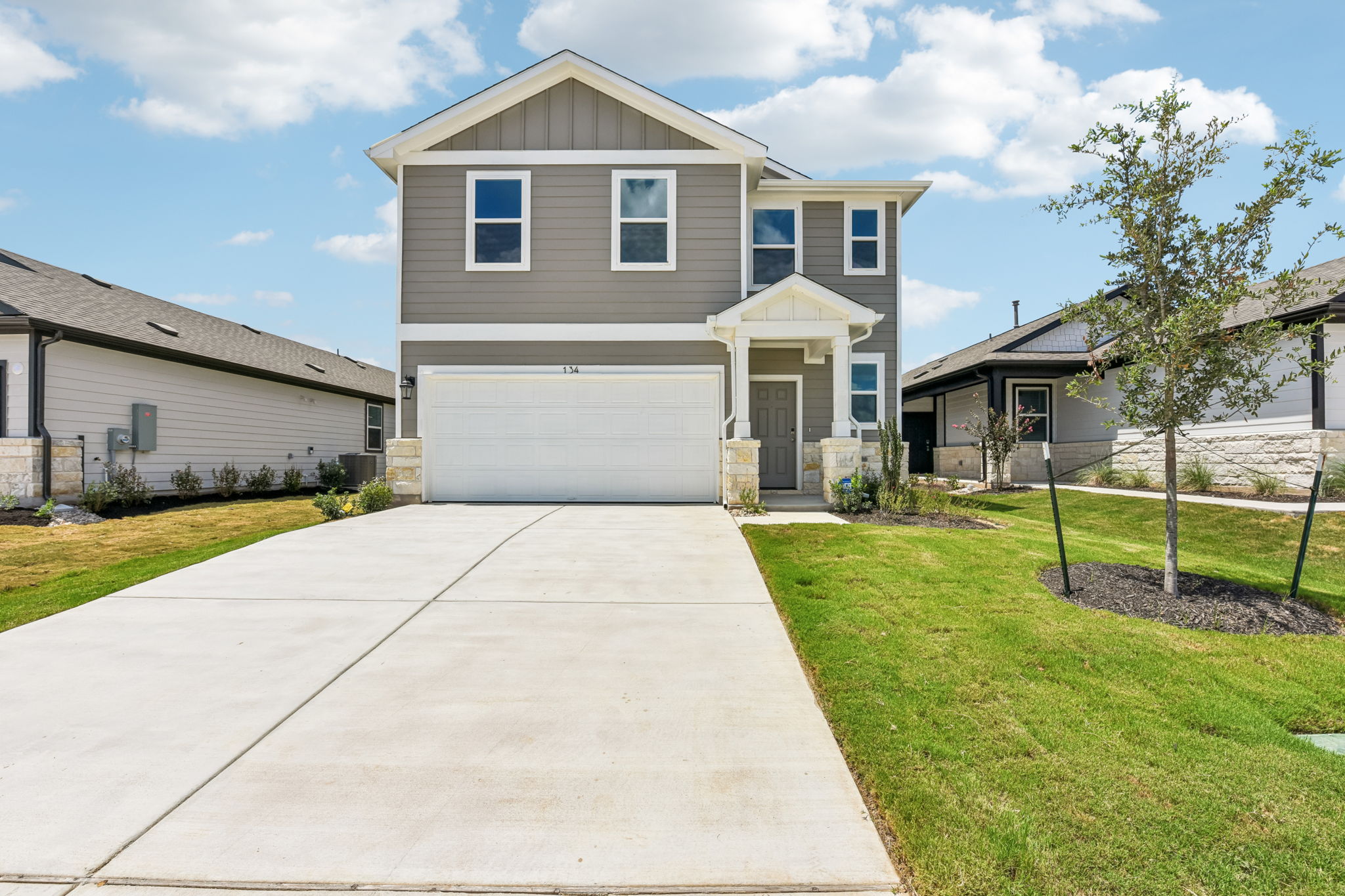 A house with a driveway.