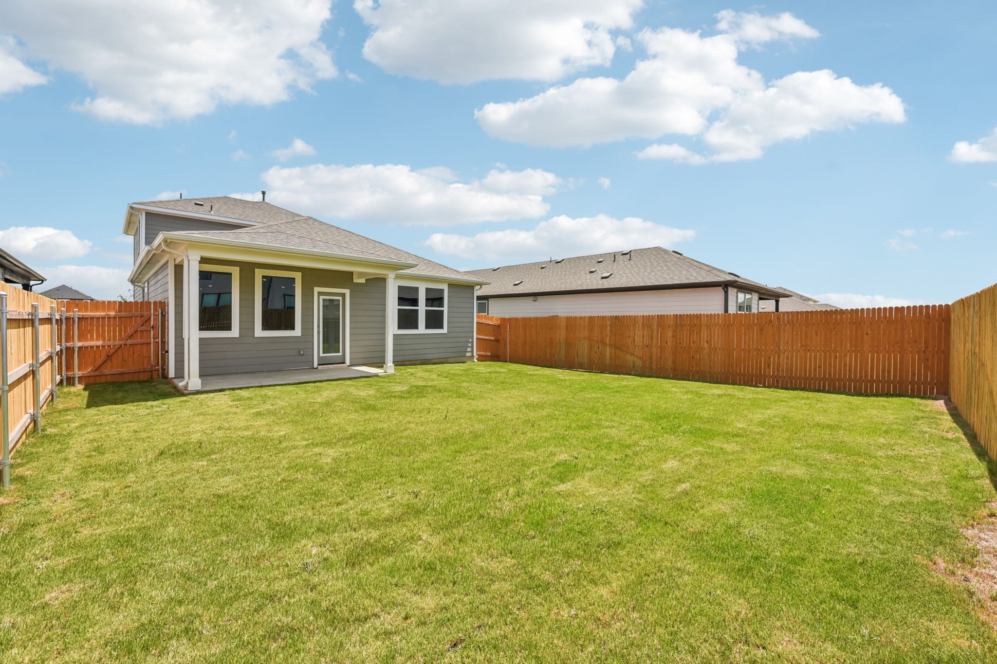 A house with a fence around it.