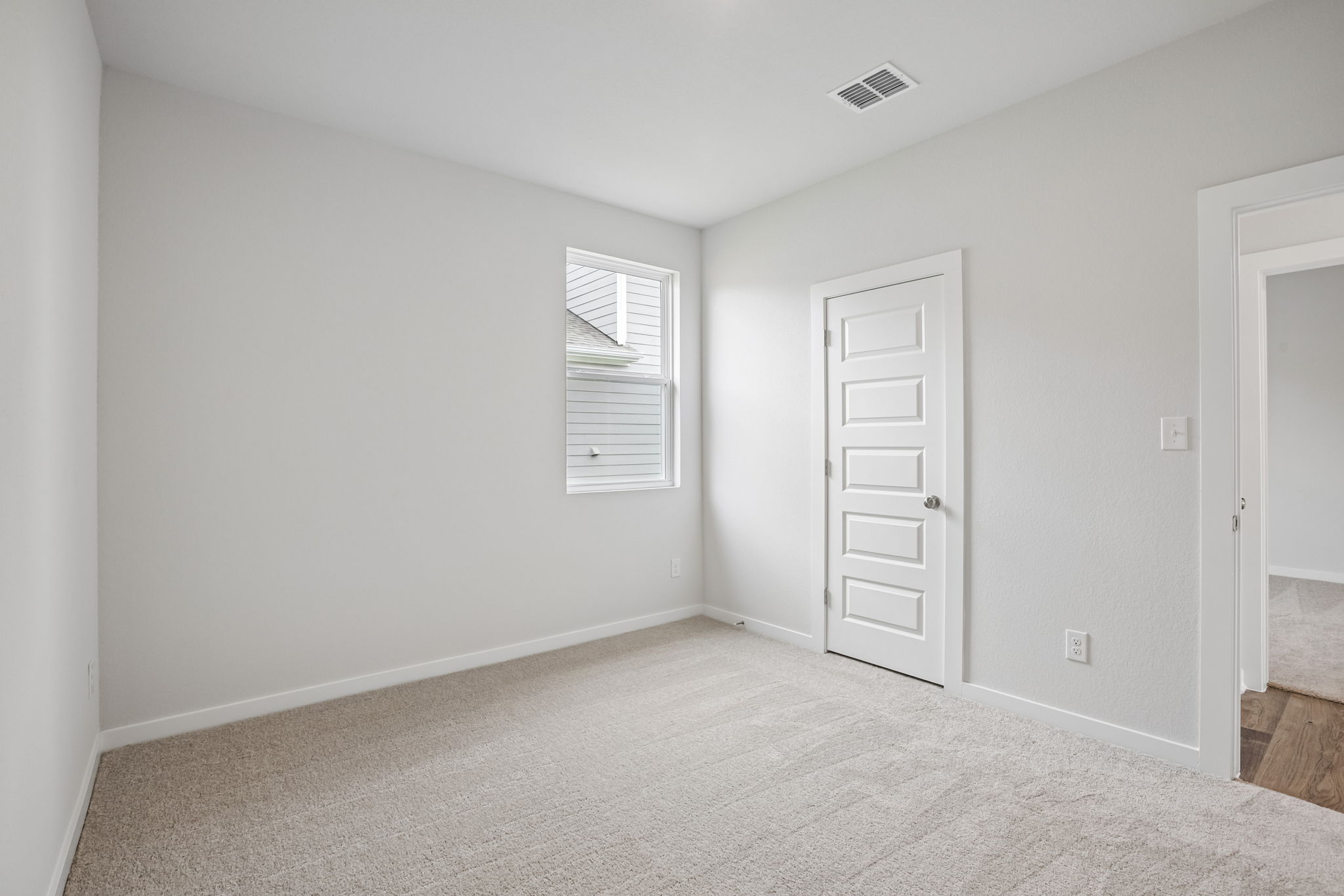 A room with white doors.