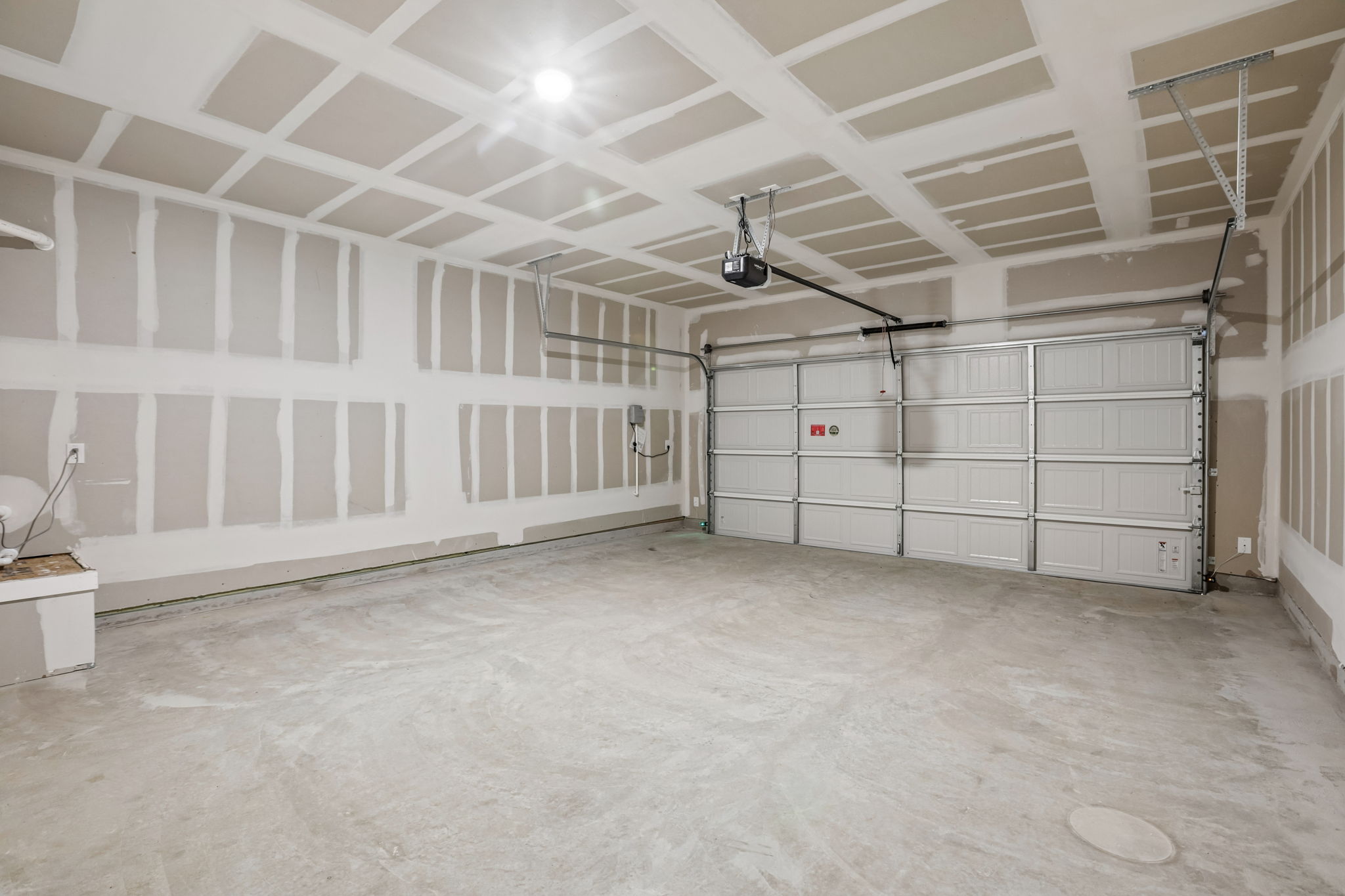 A room with white walls and a white floor.