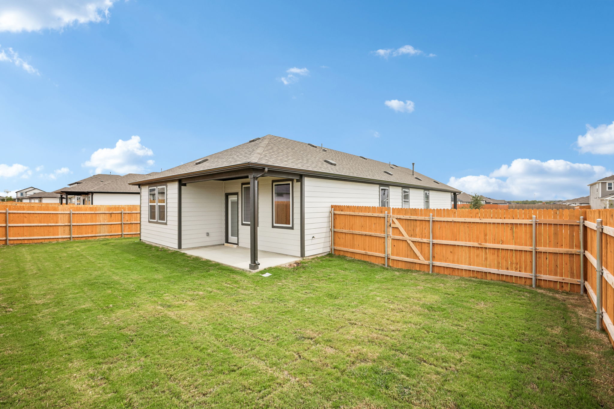 A house with a fence around it.