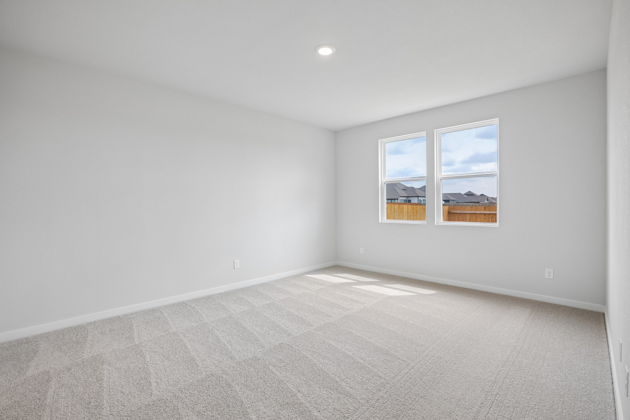 A room with a large window.