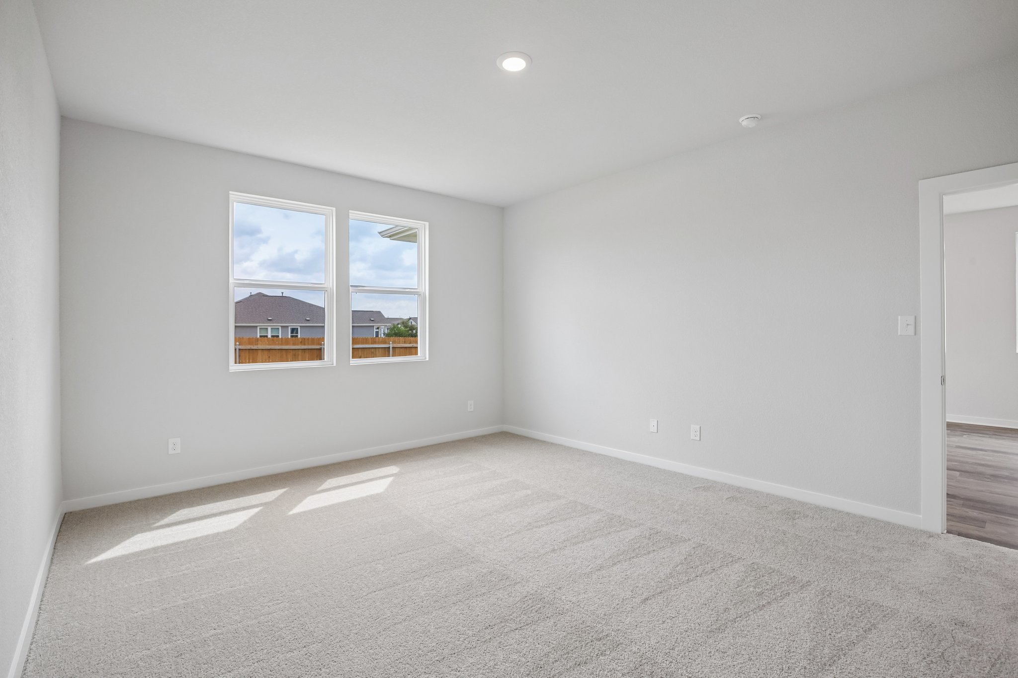 A room with a large window.