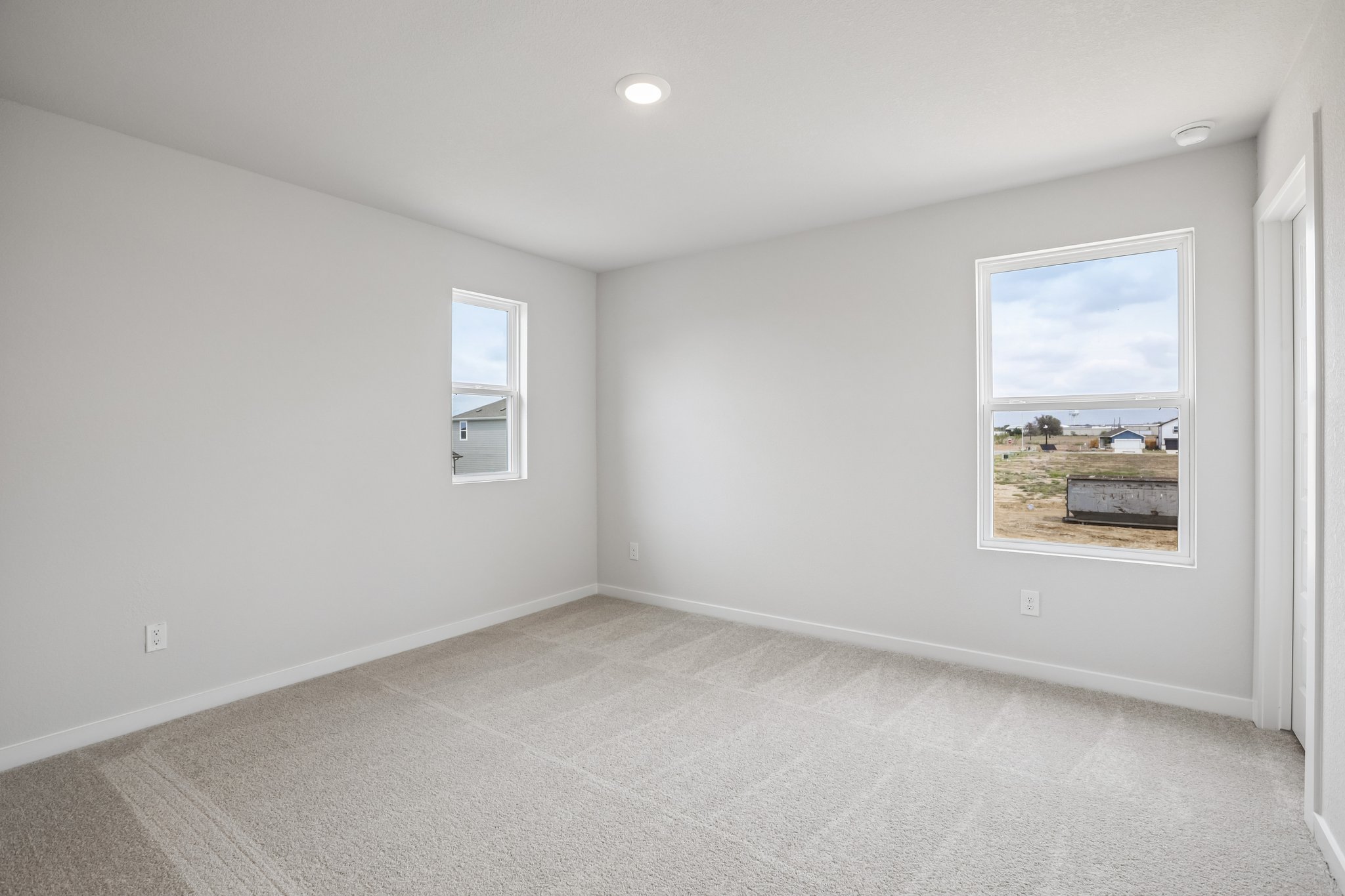 A room with a few windows.
