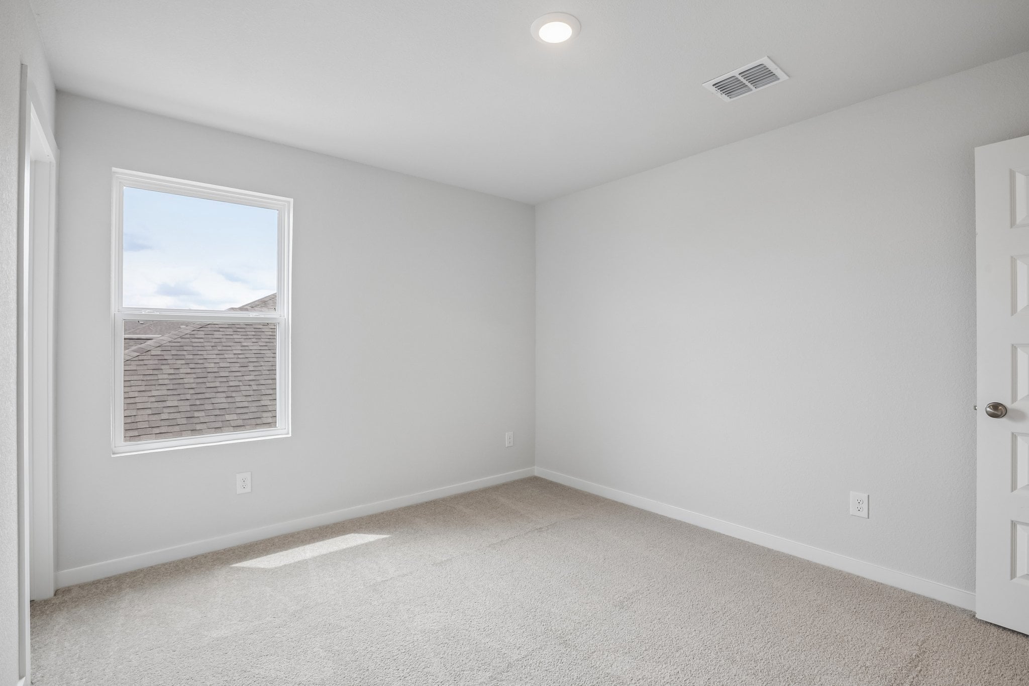 A room with white walls.