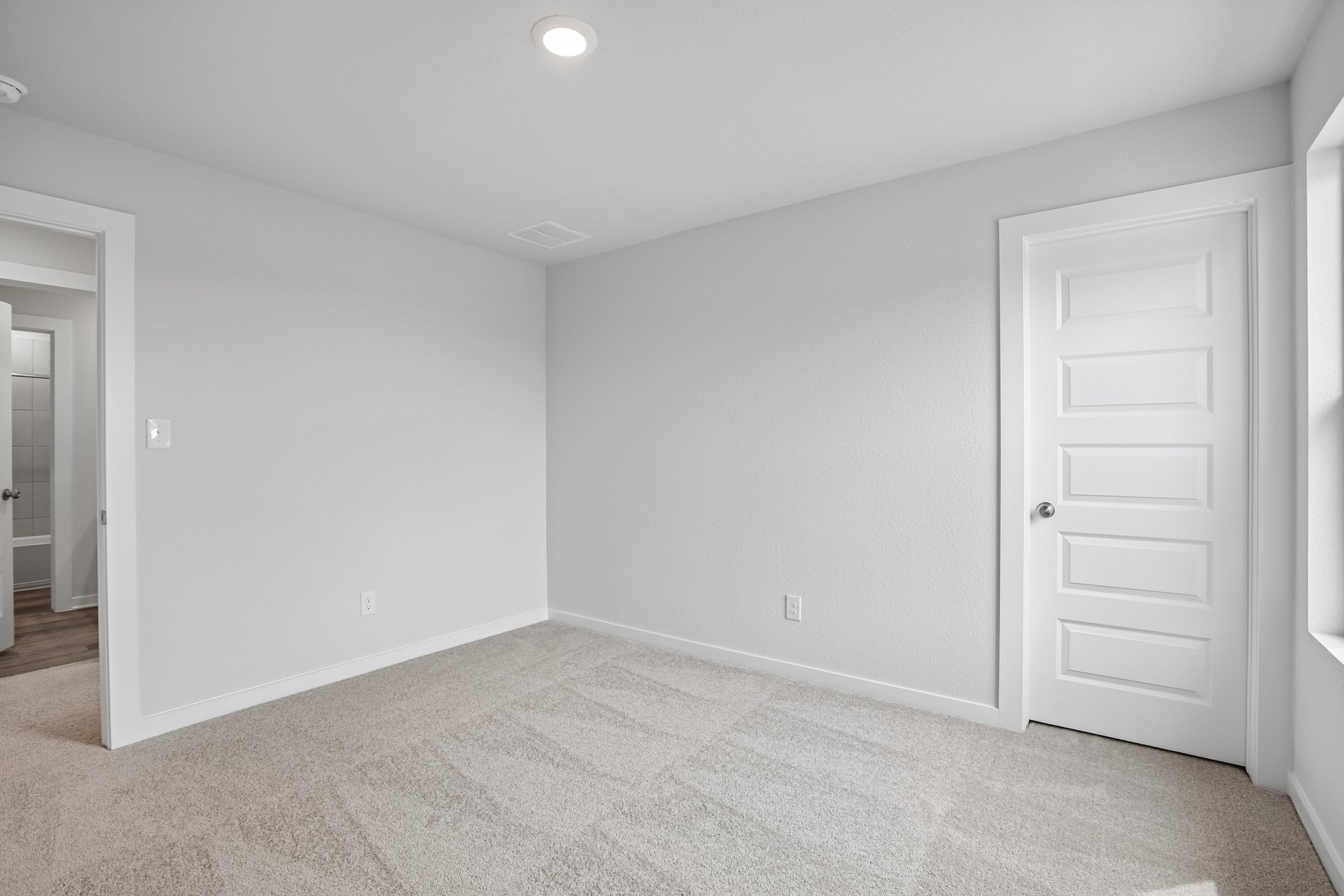 A room with white doors.
