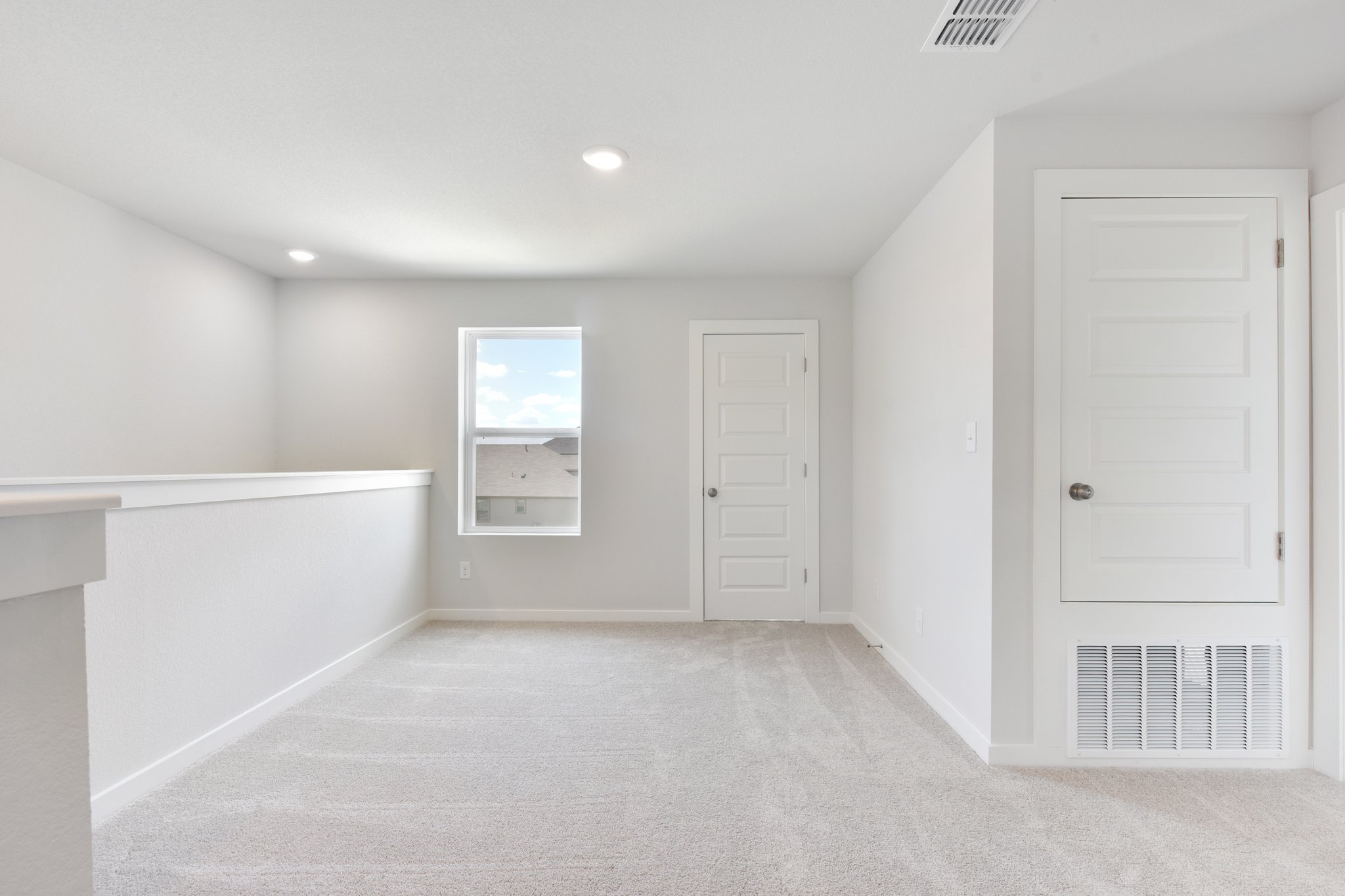 A room with white doors.