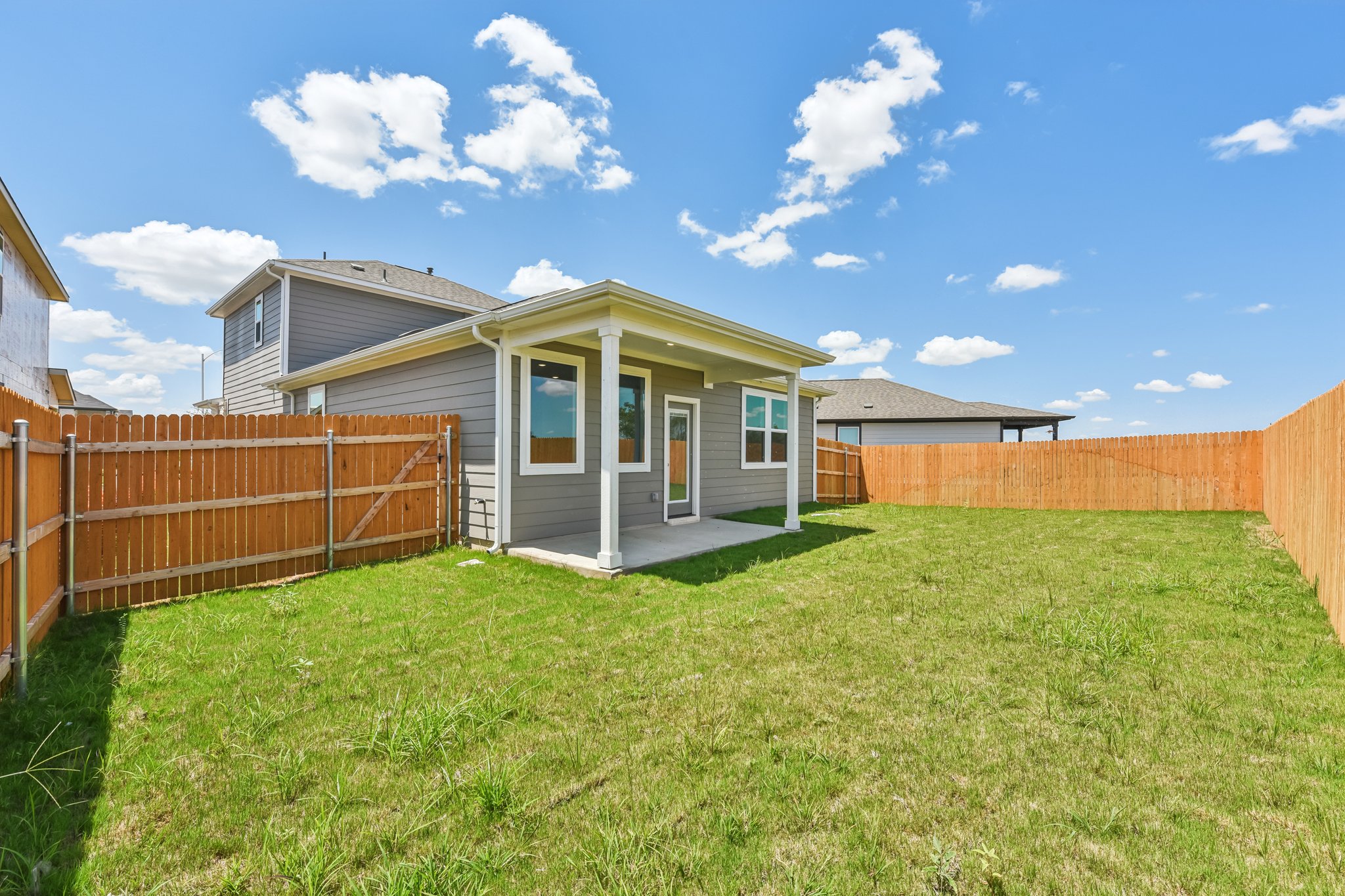 A house with a fence around it.