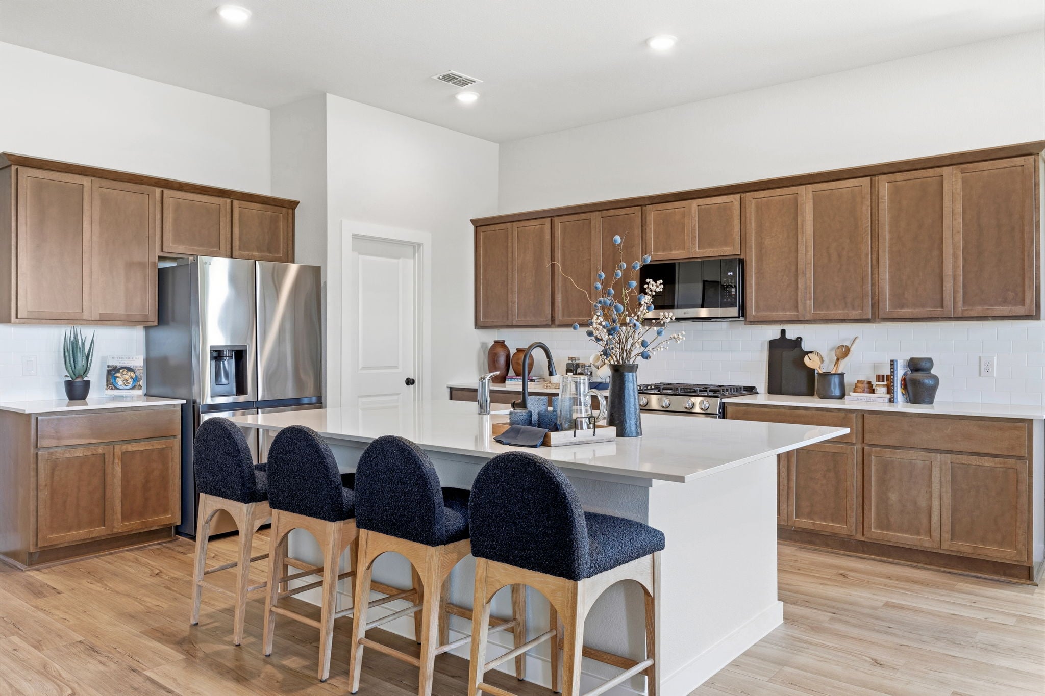 A kitchen with a large island.