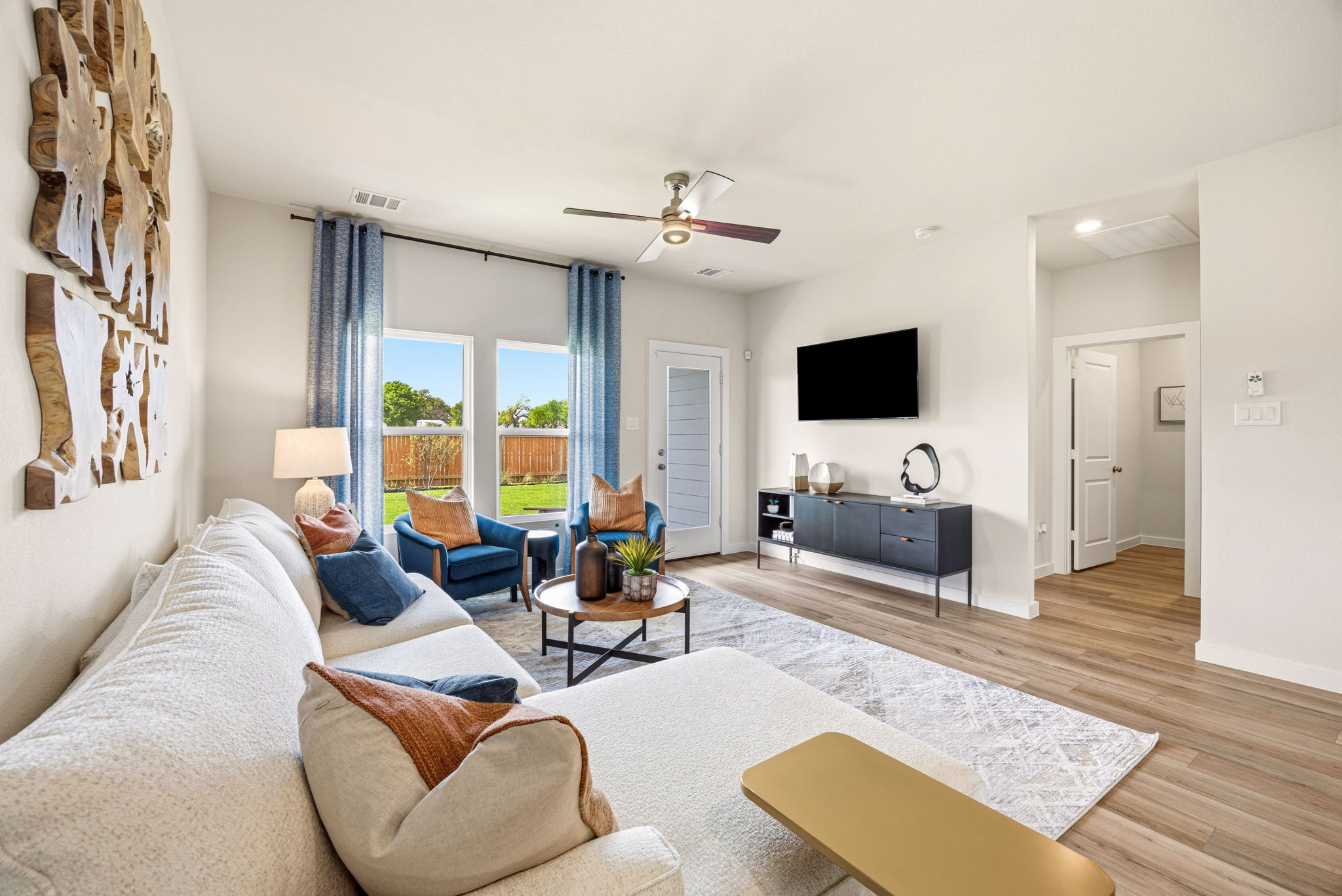 A living room with a large window.