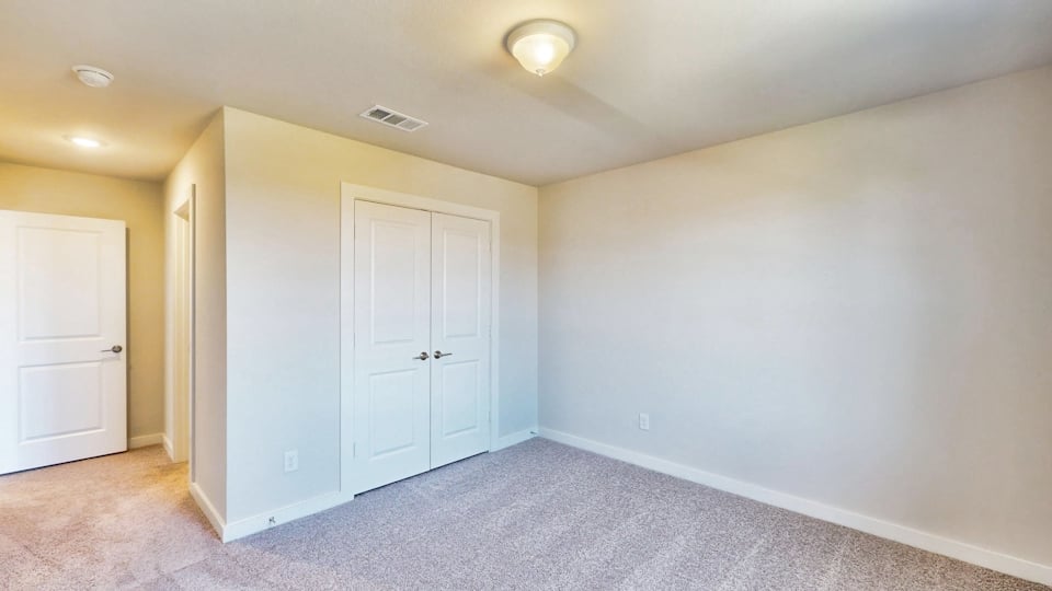 A room with white doors.