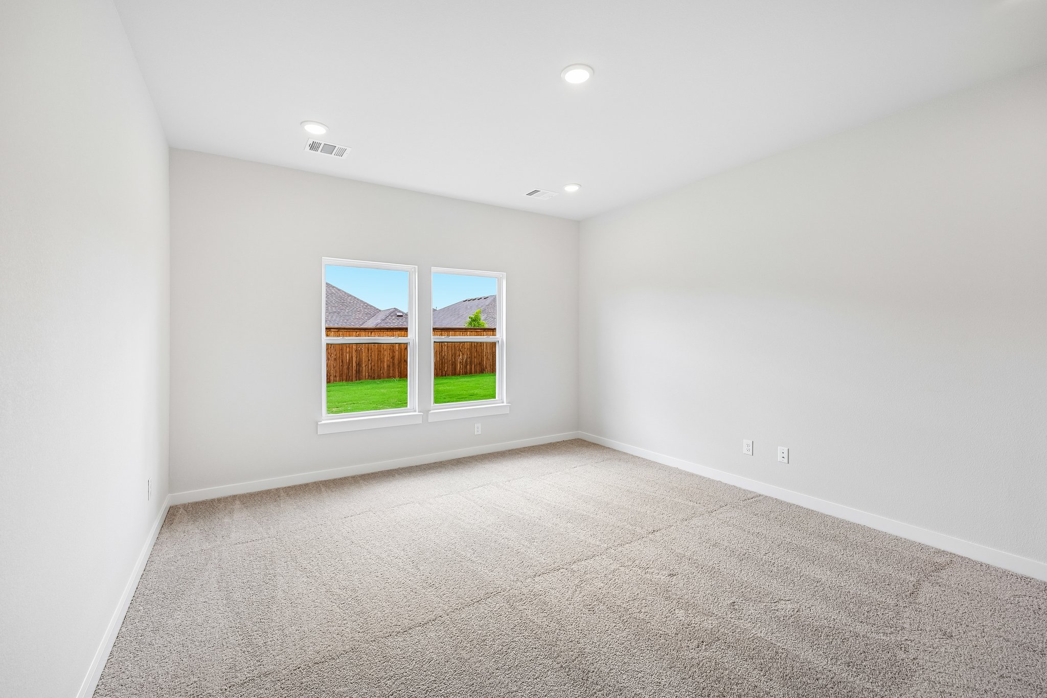 A room with a large window.