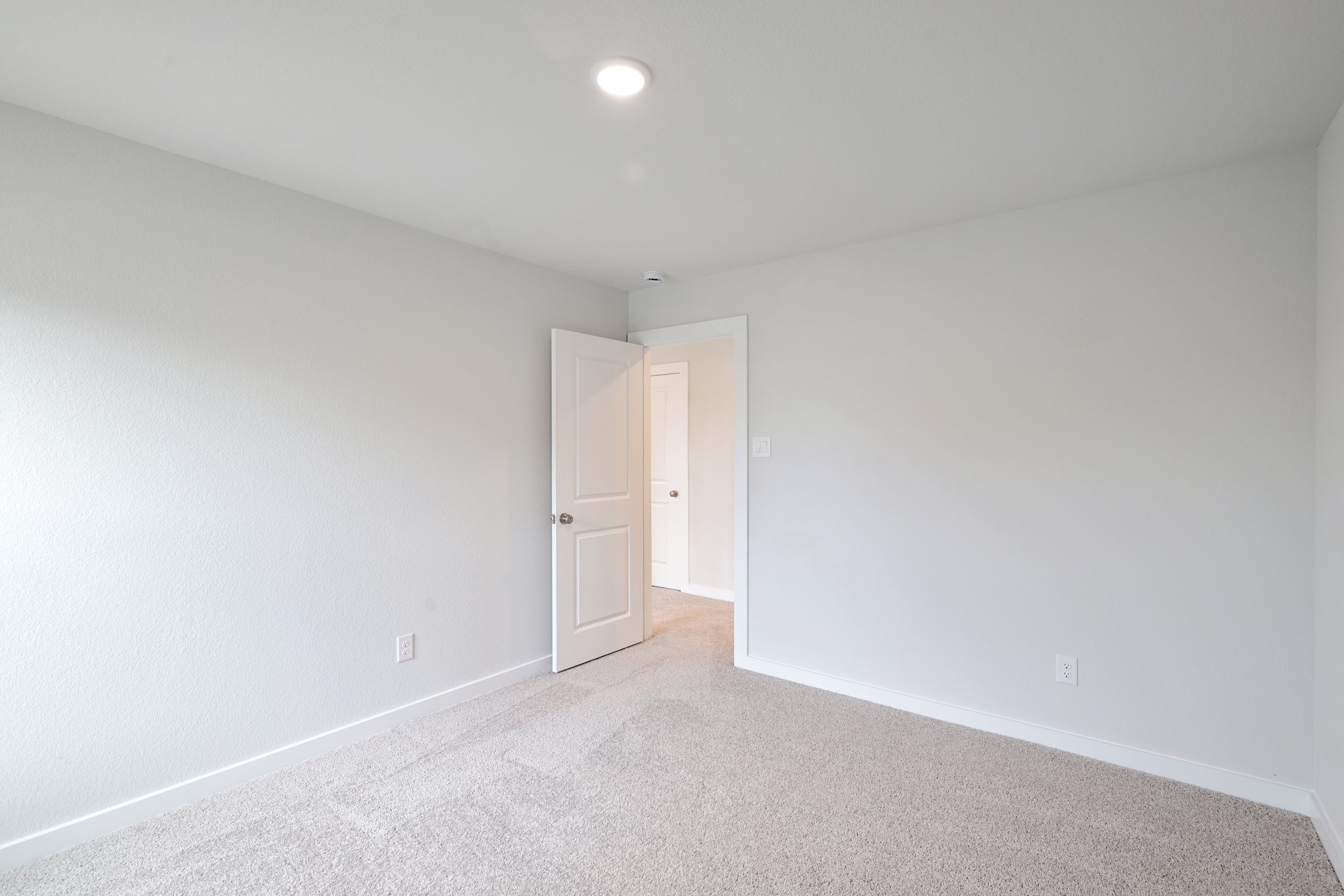 A room with white walls.