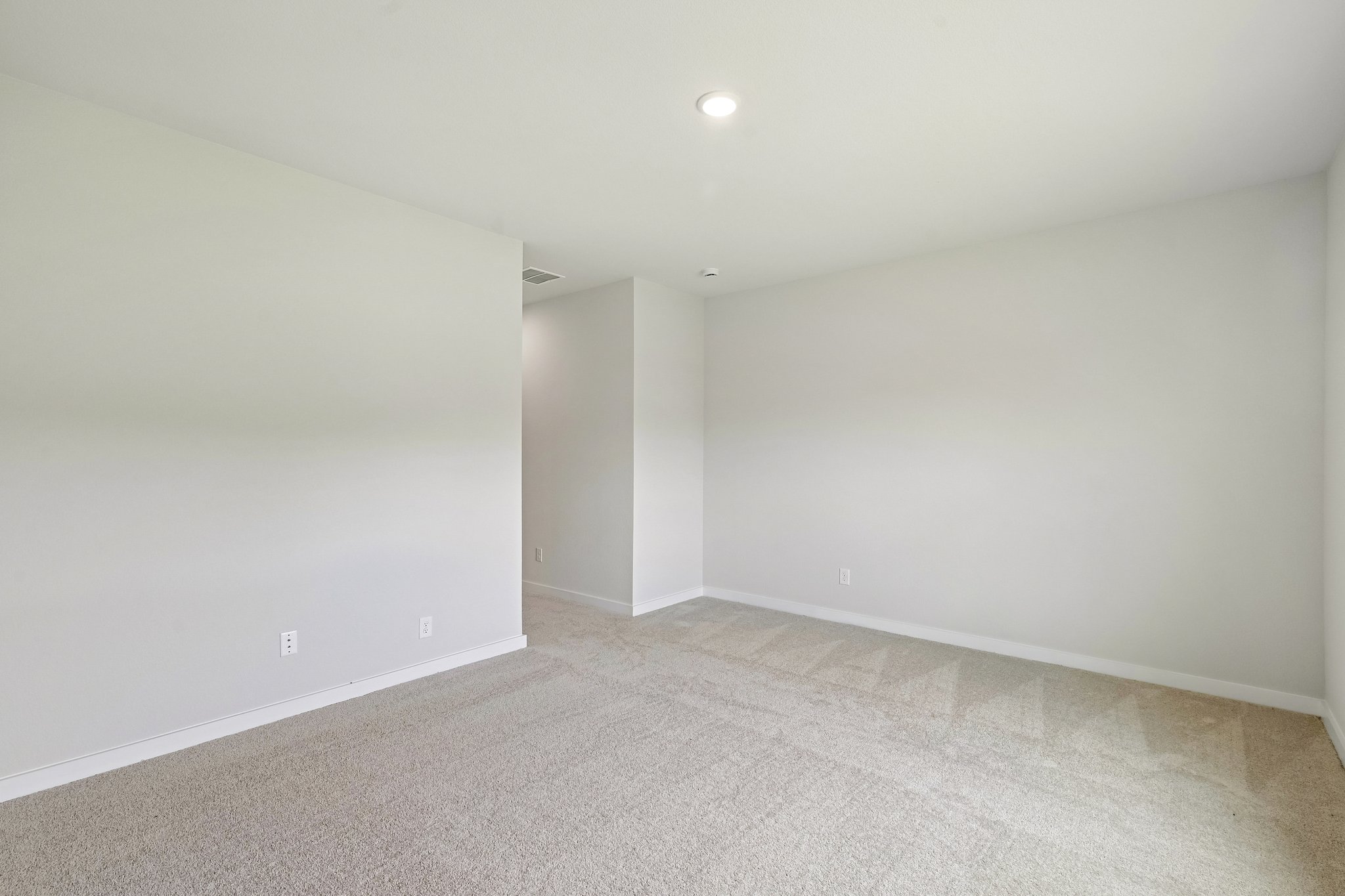A room with white walls.