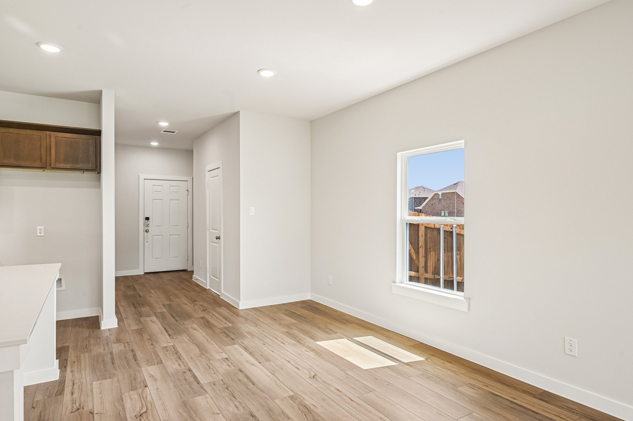A room with a wood floor and a wood floor.