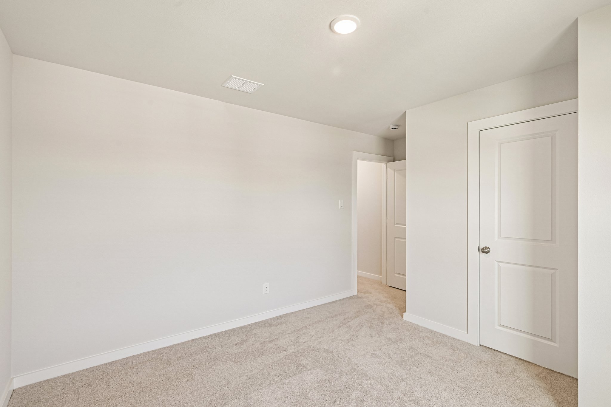 A room with white doors.
