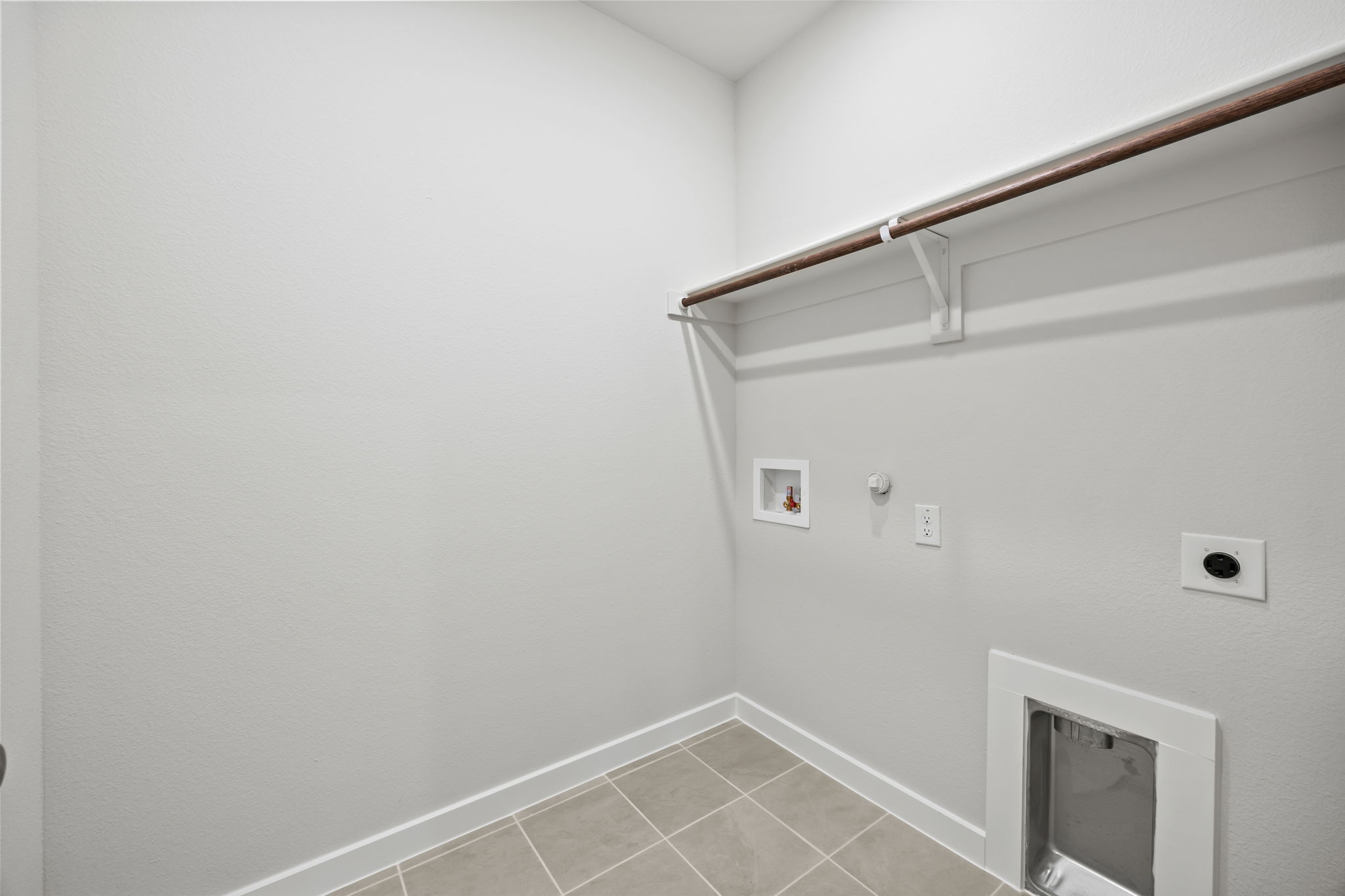 A white room with a white ceiling.