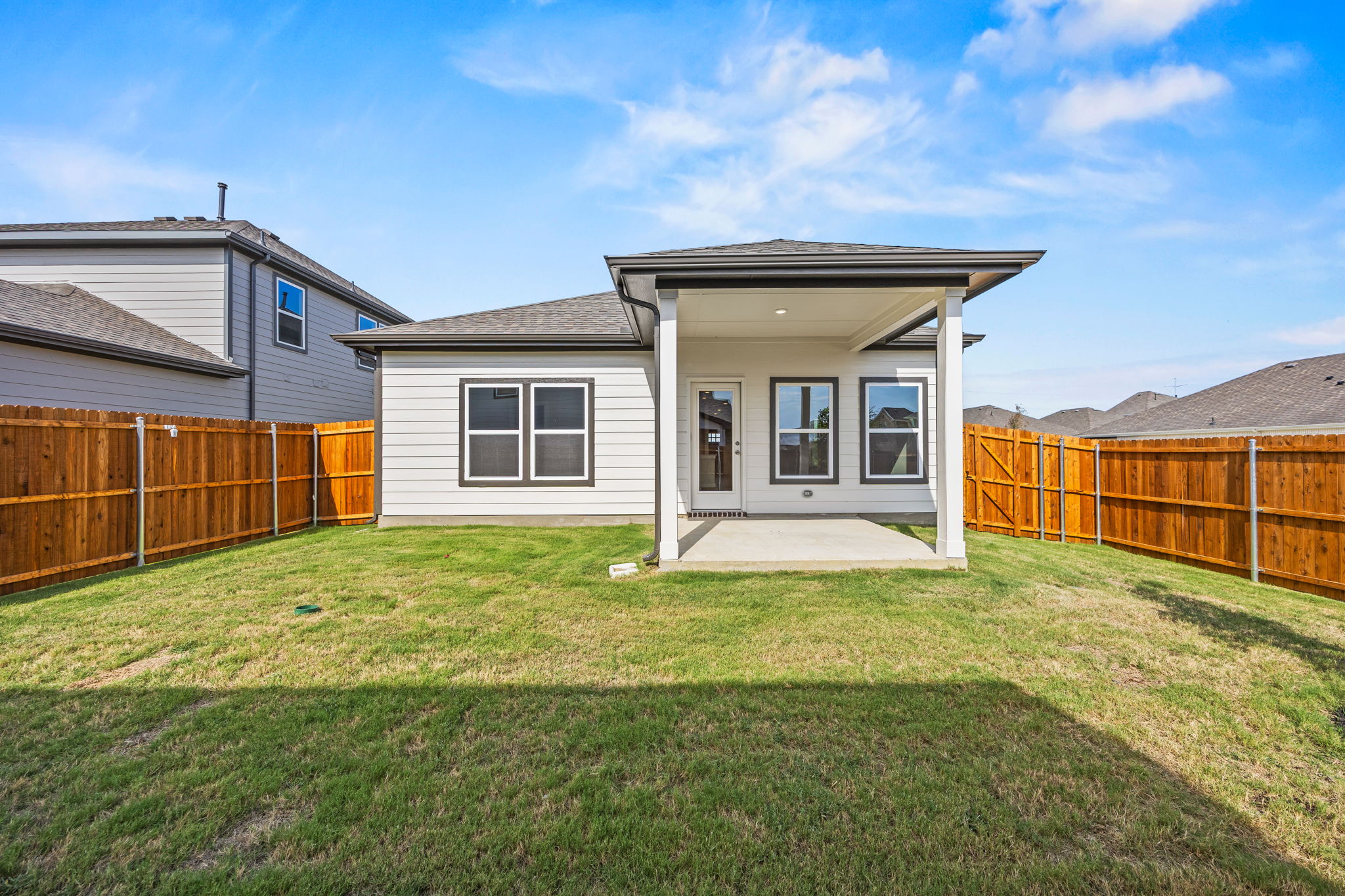 A house with a fence around it.