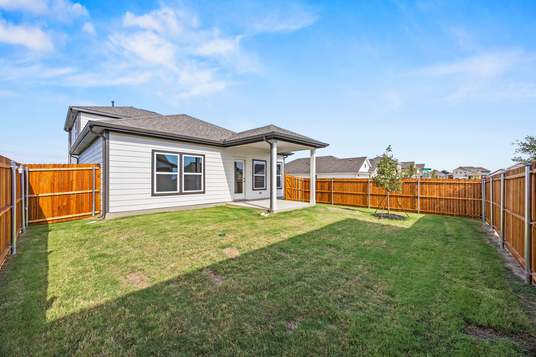 A house with a fence around it.