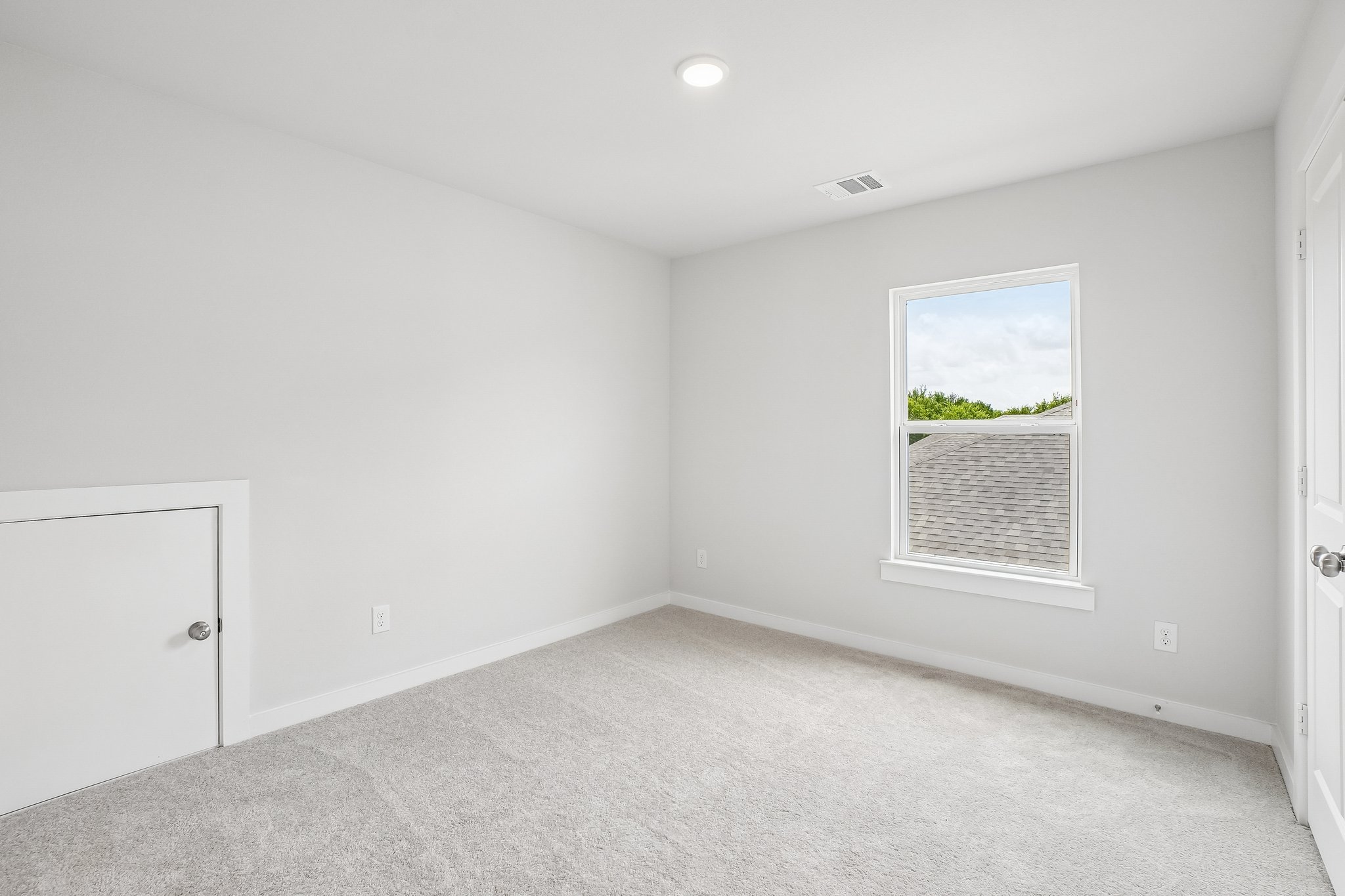 A room with white walls.