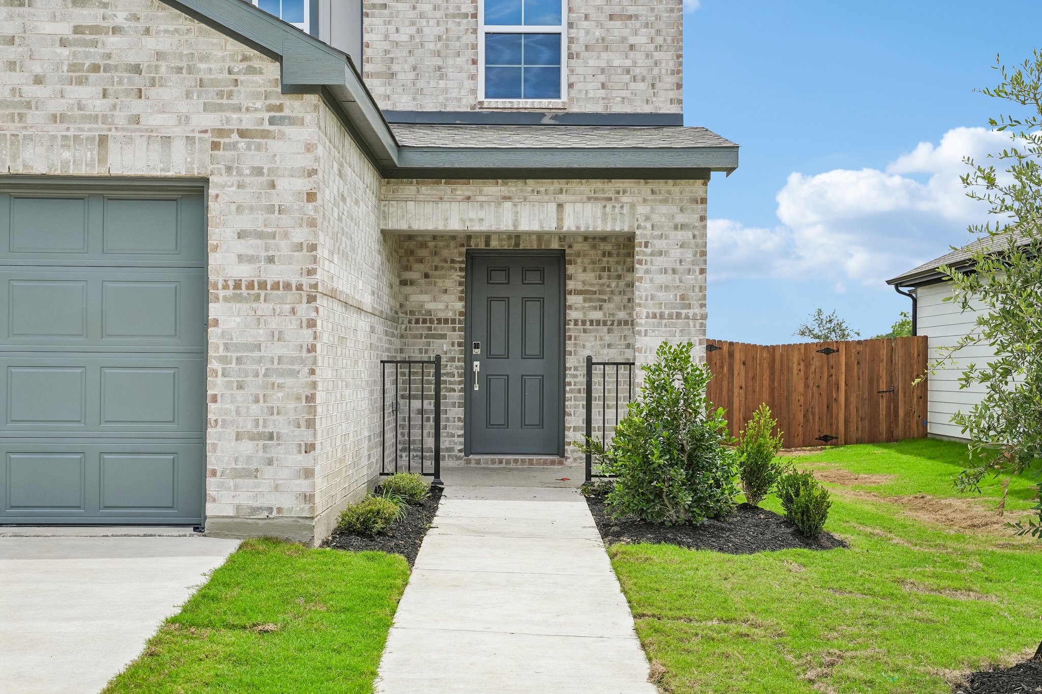 A house with a front yard.