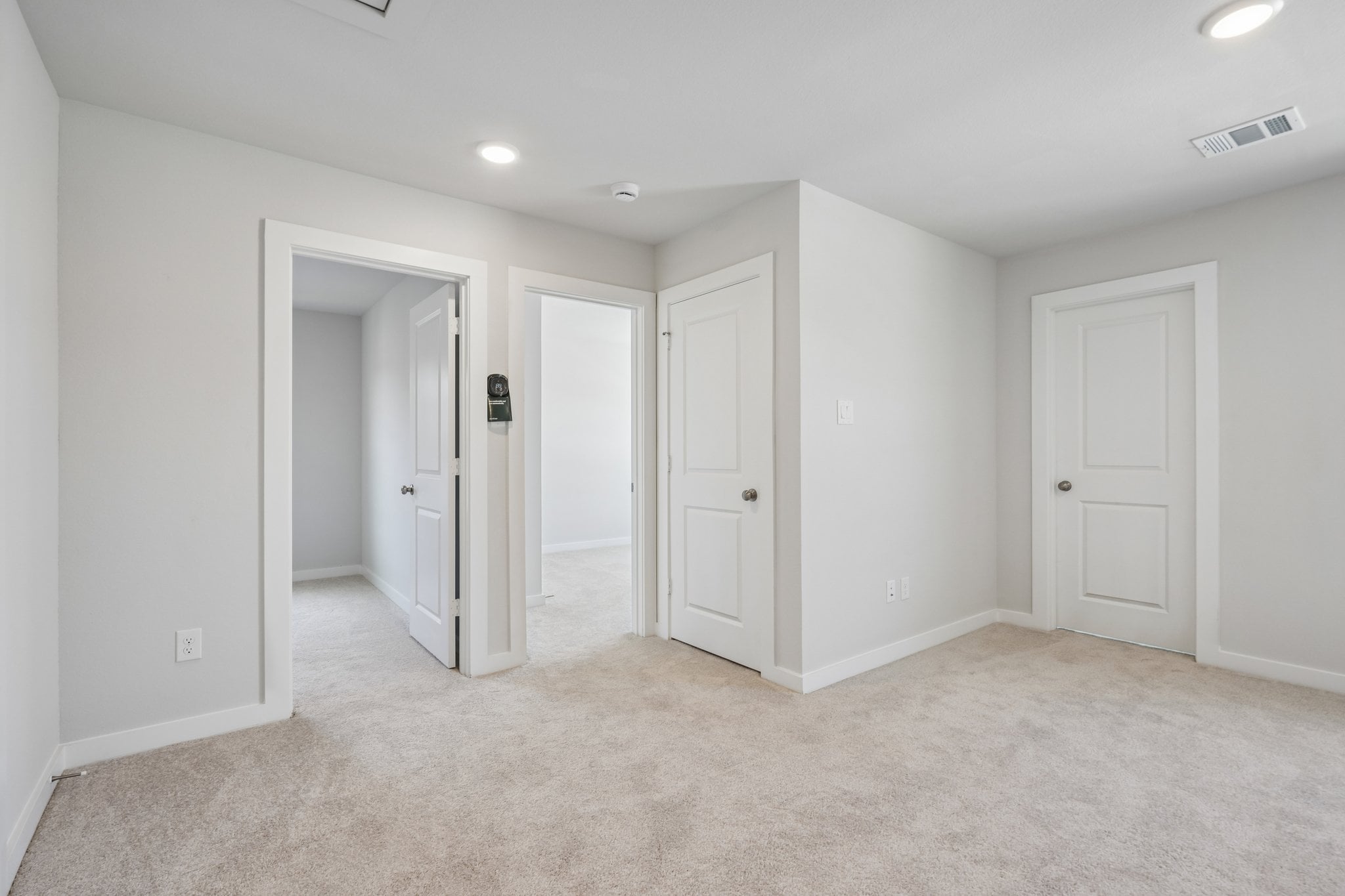 A room with white doors.