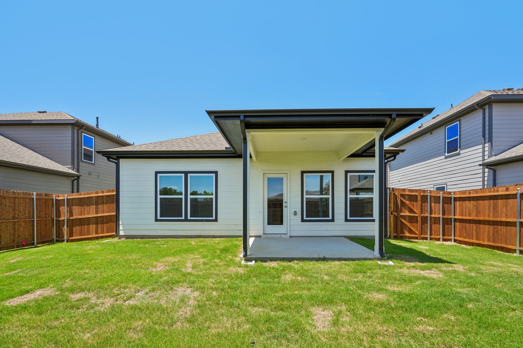 A house with a fence around it.