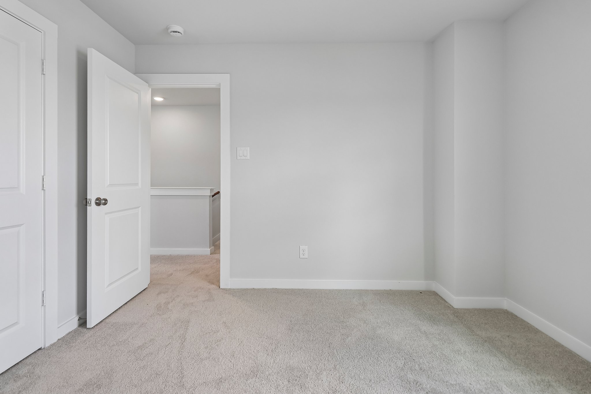A room with white doors.